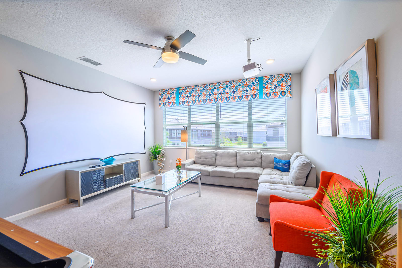 Massive projection screen and billiards table in the upstairs lounge