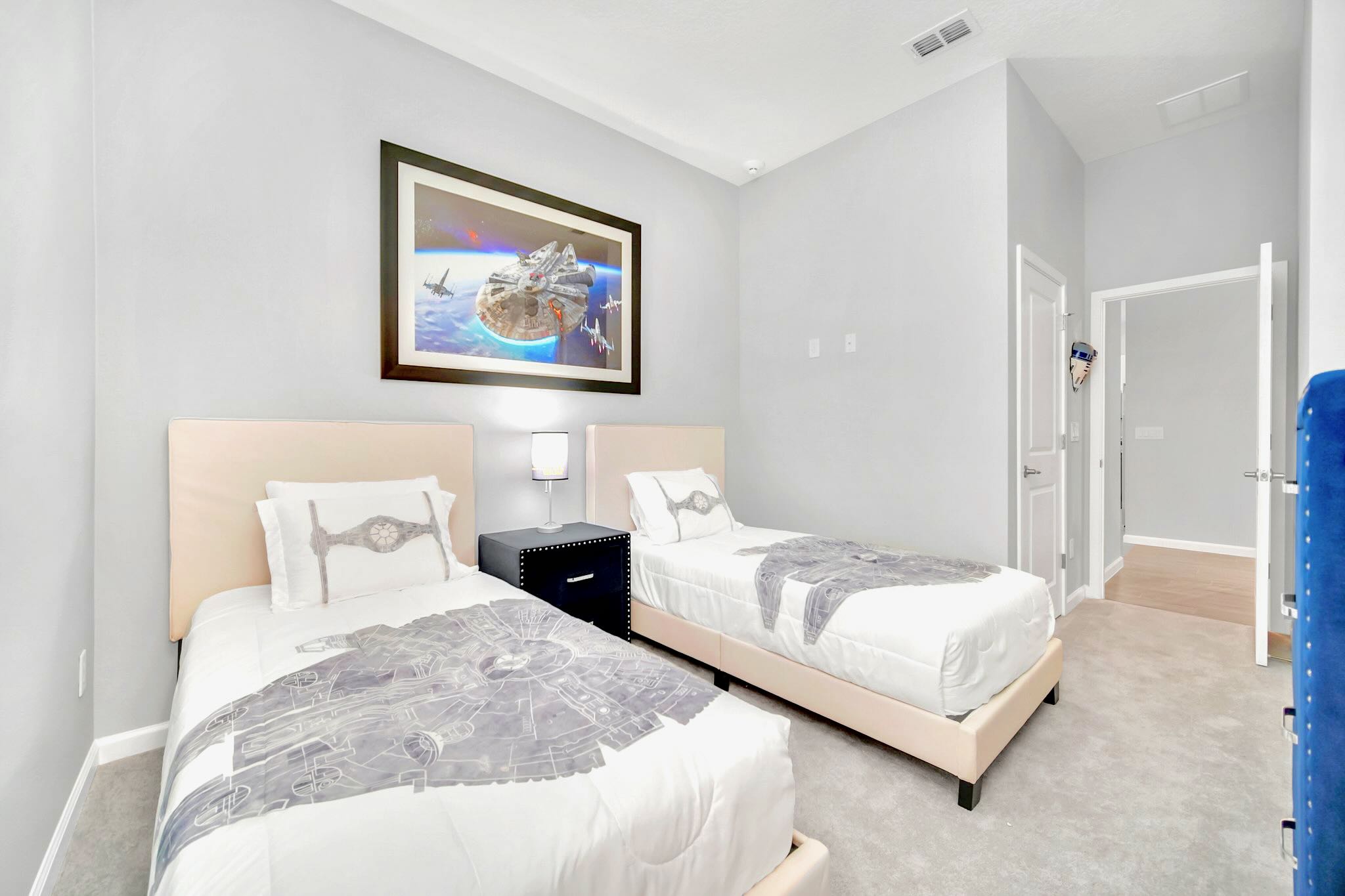 Bright Room Featuring Two Twin Beds And A Smart TV For A Relaxing Stay