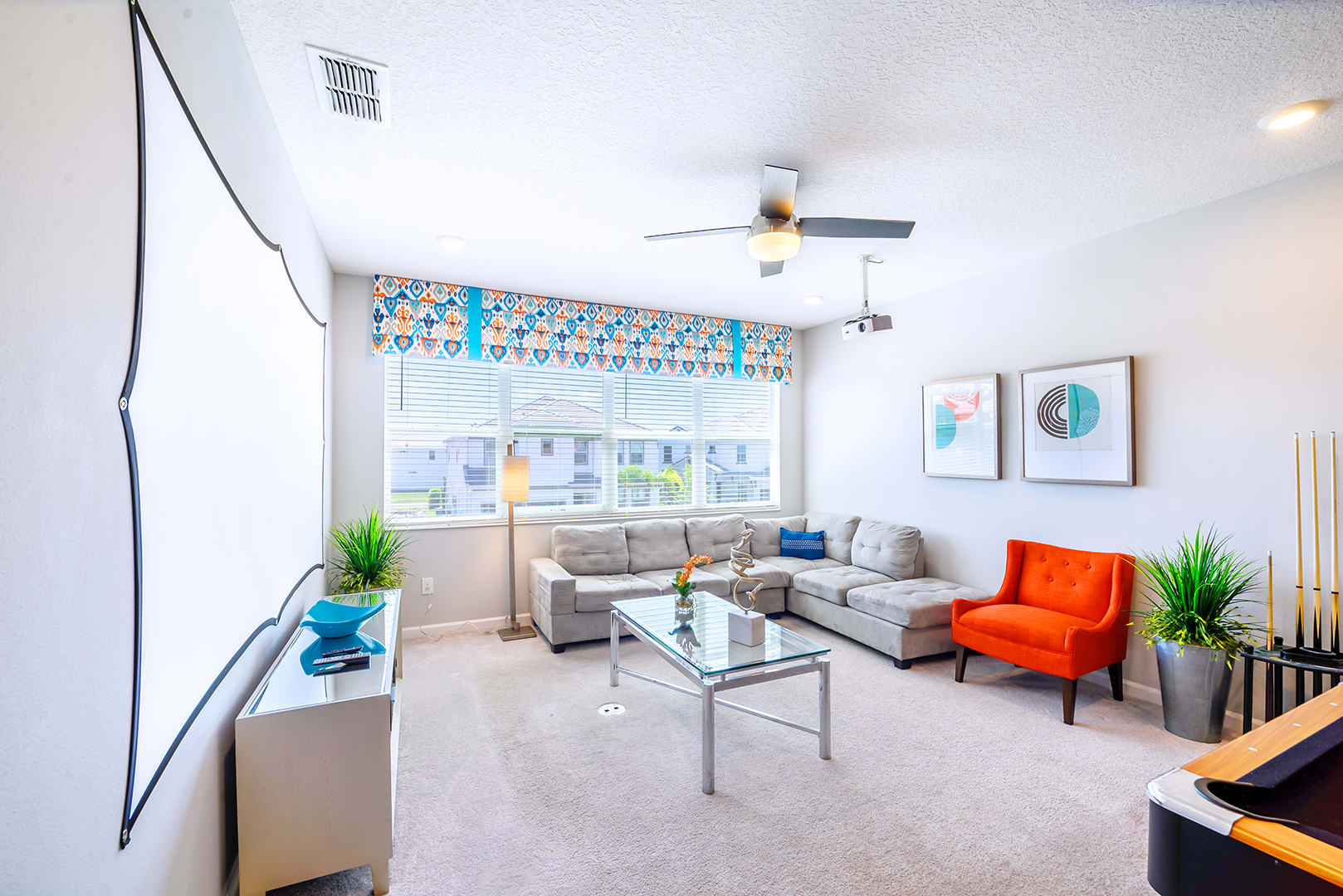 Massive projection screen and billiards table in the upstairs lounge