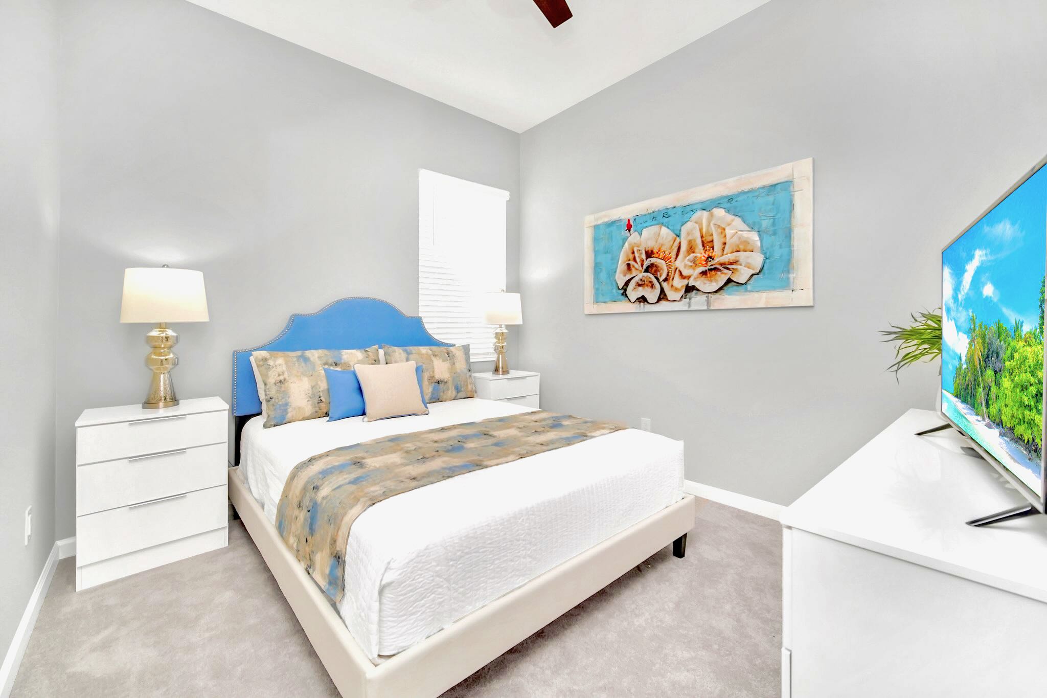 Expansive King Bedroom Featuring Sleek Design And Smart TV