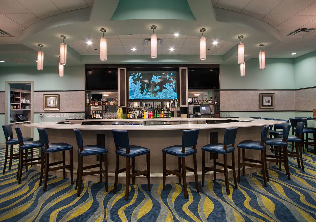 Modern Clubhouse Bar Offering Drinks And Entertainment