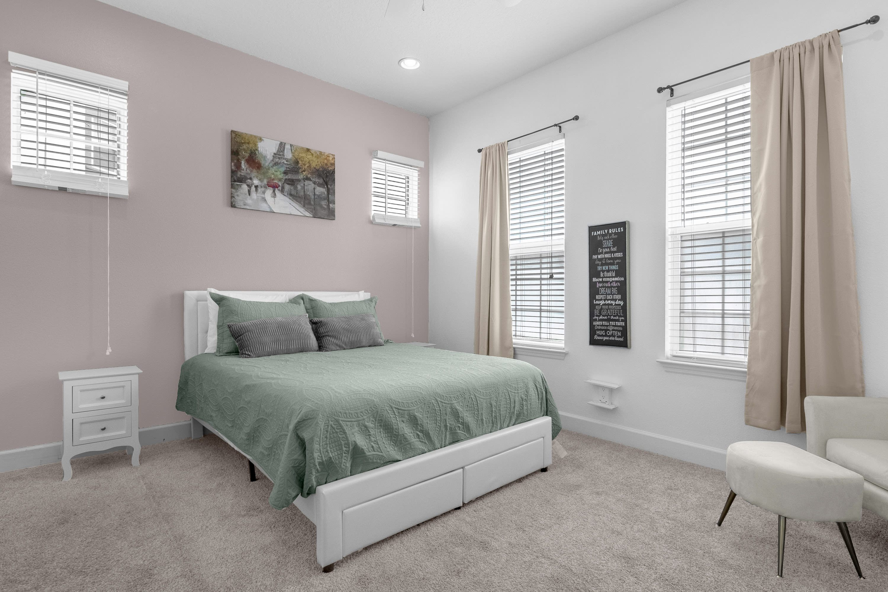 Bright Queen Bedroom With Soft Green Tones And Natural Light
