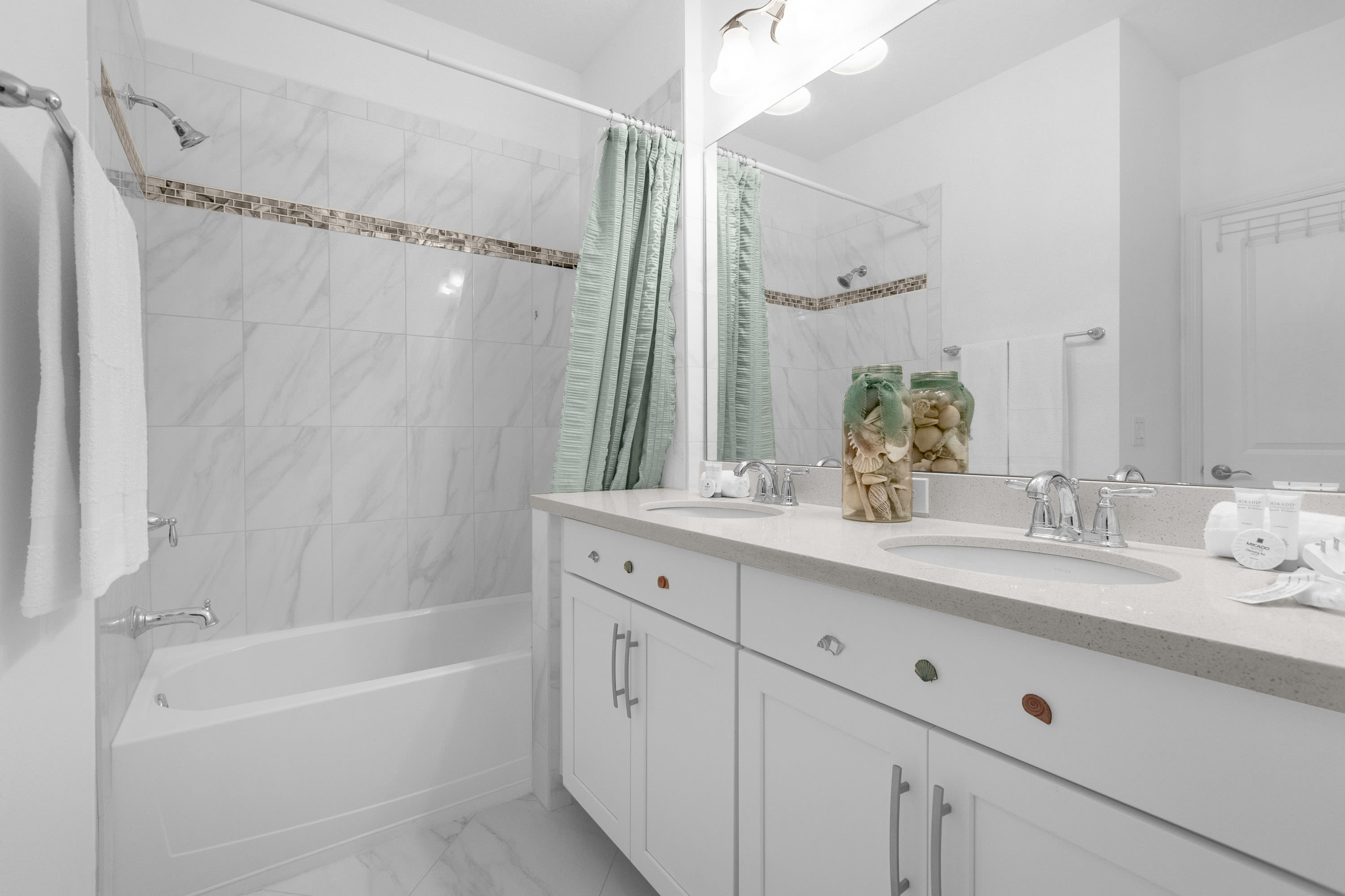 Stylish Bathroom Featuring Marble Accents And Modern Fixtures
