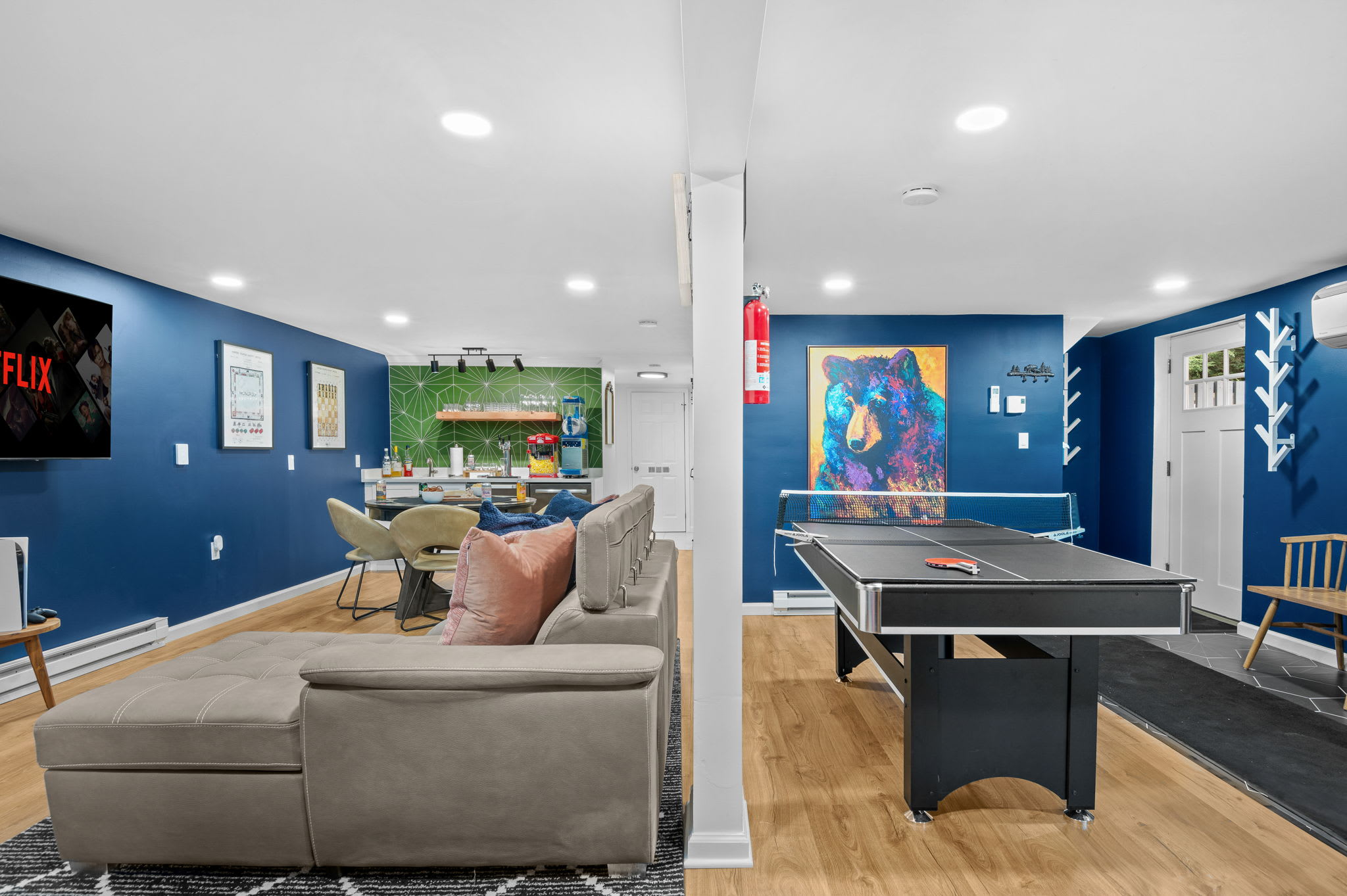 Challenge your friends to a ping pong match, relax with a movie, or enjoy a drink in this stylish entertainment space.