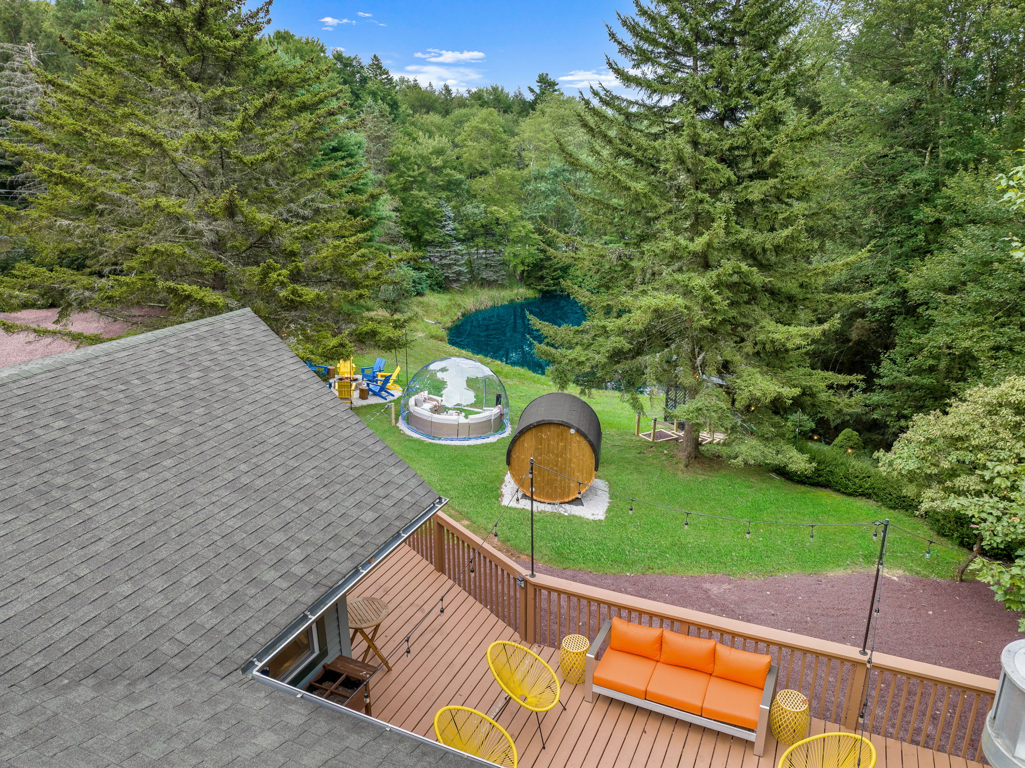 Wake up to breathtaking views of your private oasis, complete with a scenic deck, a cozy sauna, and a relaxing igloo lounge.