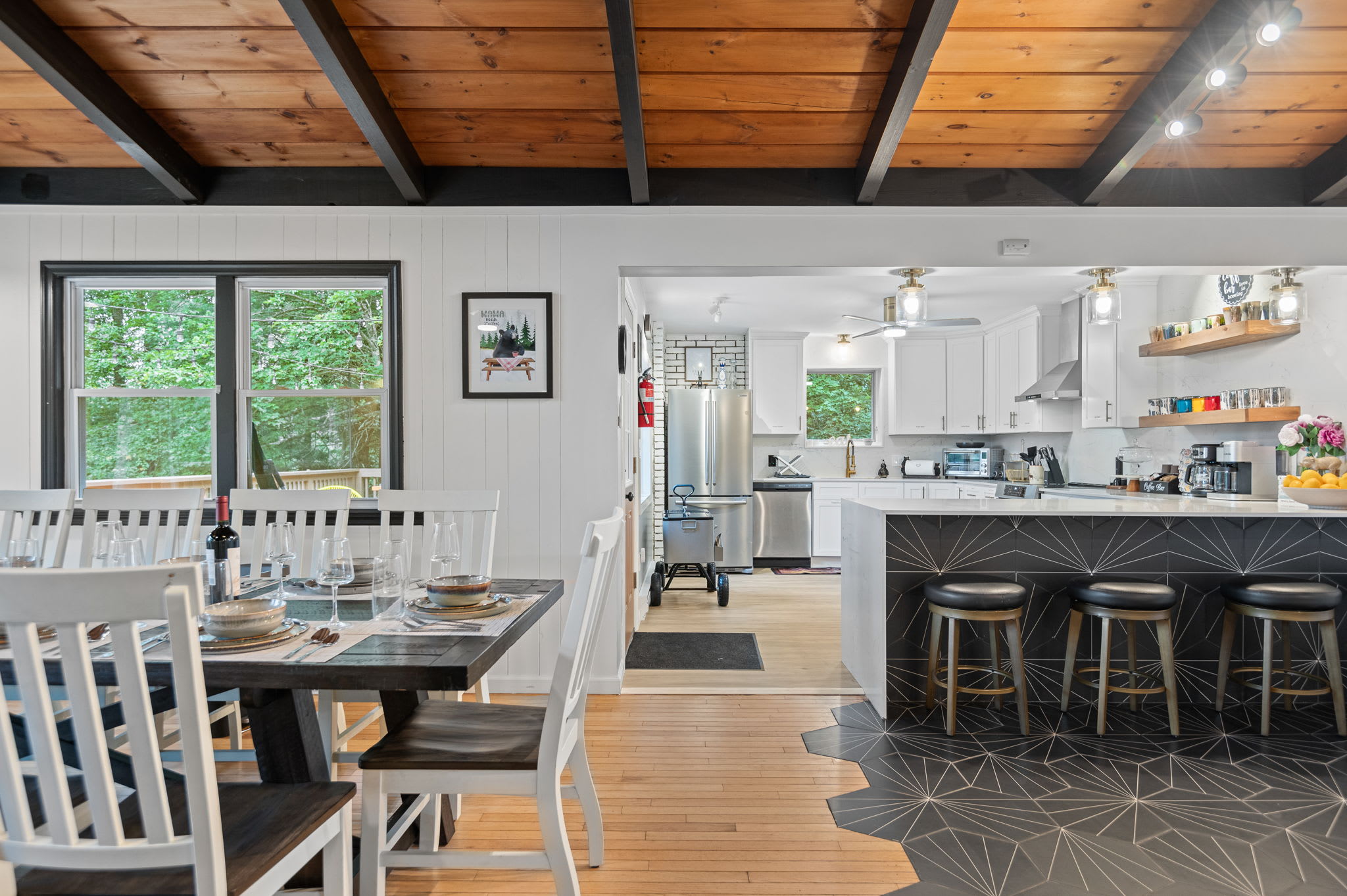 The heart of the home features an open kitchen and dining layout, making entertaining effortless and enjoyable.