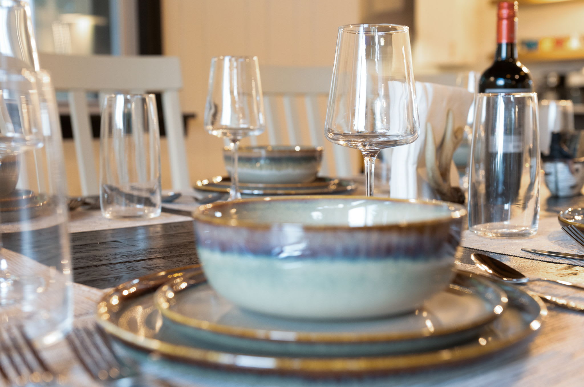 Thoughtfully curated tableware and cozy ambiance create the ultimate dining experience for friends and family.