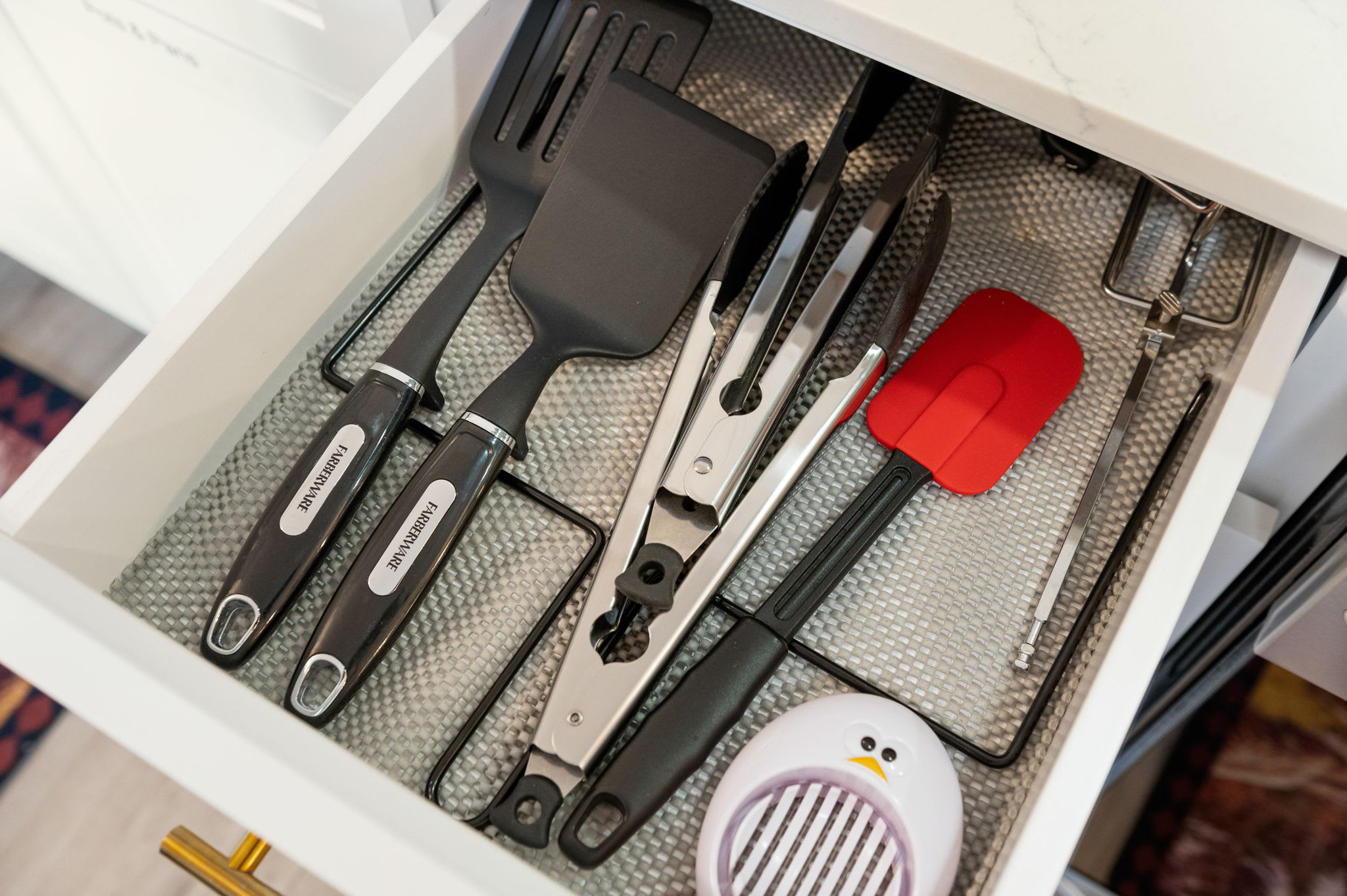Whether you're flipping pancakes or grilling steaks, this drawer is packed with high-quality cooking tools to make meal prep a breeze.