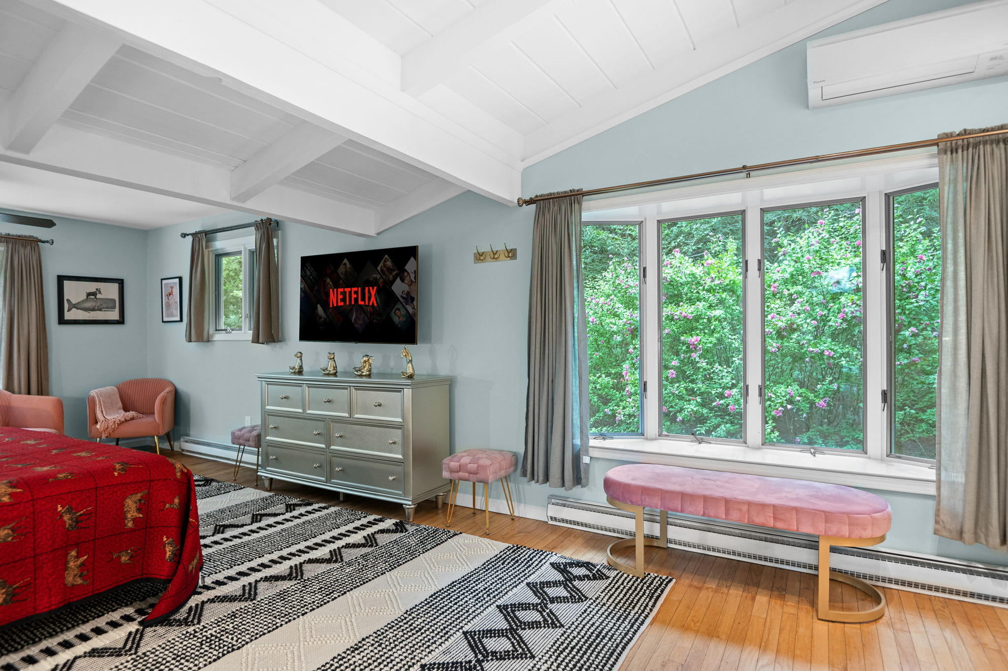 Large windows bring in plenty of natural light, creating a peaceful and relaxing retreat to start and end your day.