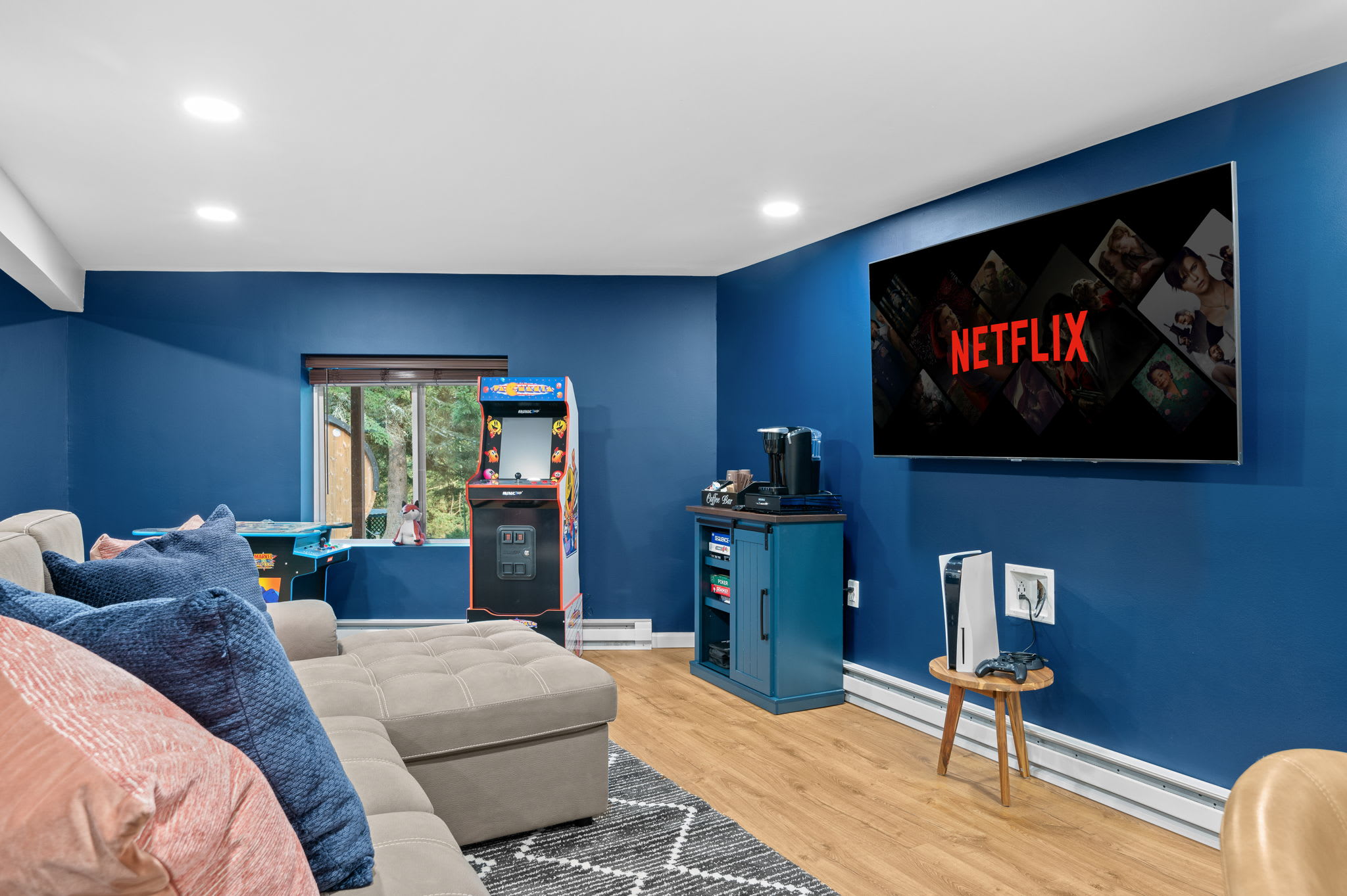 Whether it’s movie nights, arcade battles, or a relaxing coffee break, this game room has it all!