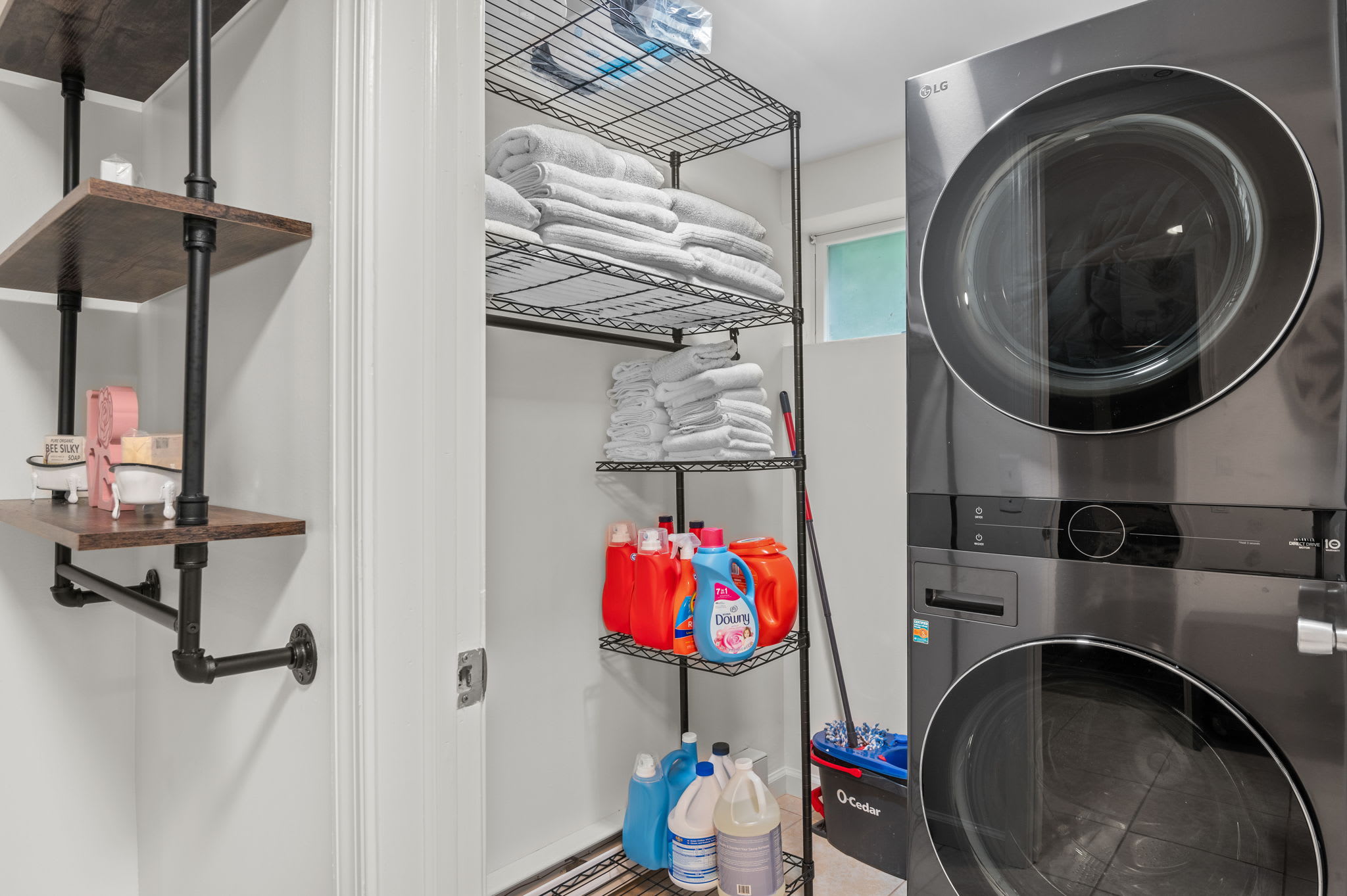 A fully stocked laundry area with high-efficiency appliances, fresh towels, and all the essentials to keep your stay hassle-free.