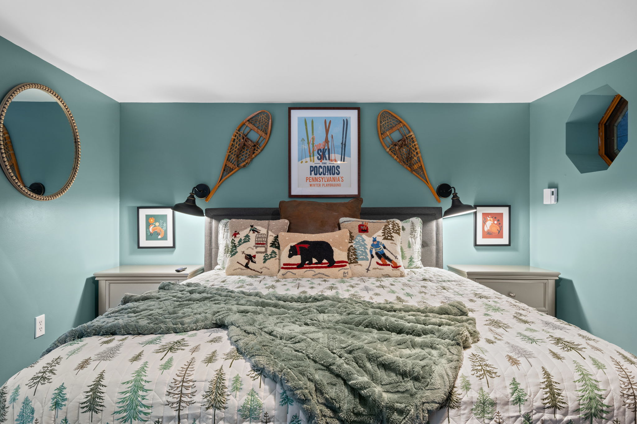 Woodsy decor, vintage ski gear, and soft, inviting textures create the perfect ambiance for a peaceful night’s sleep.