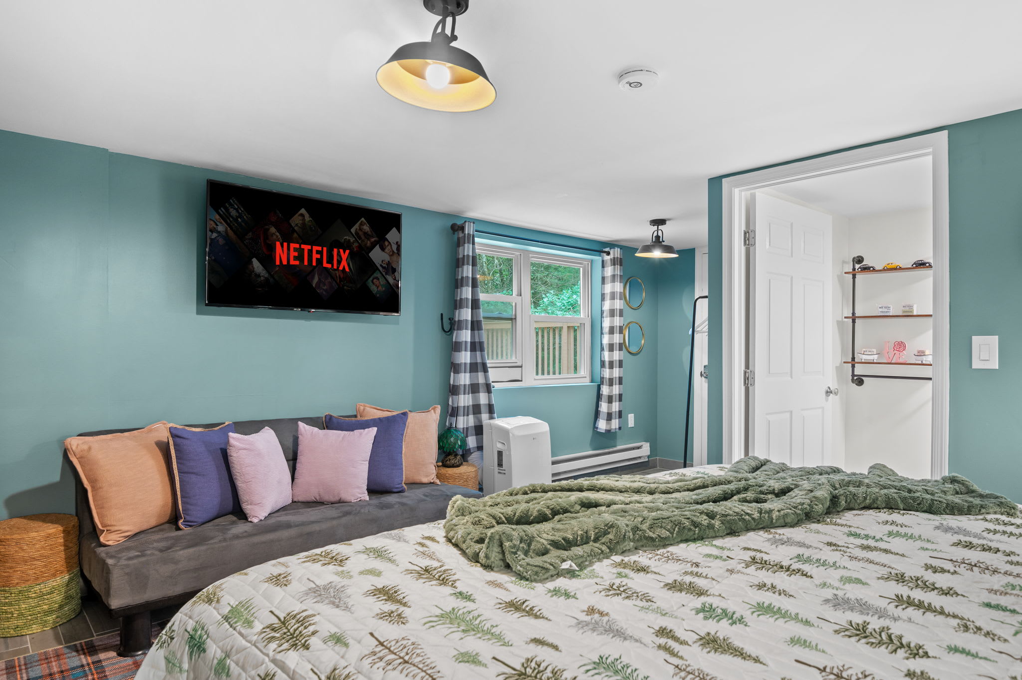 With a plush bed, cozy lounge area, and an in-room TV, this inviting retreat is designed for total relaxation.