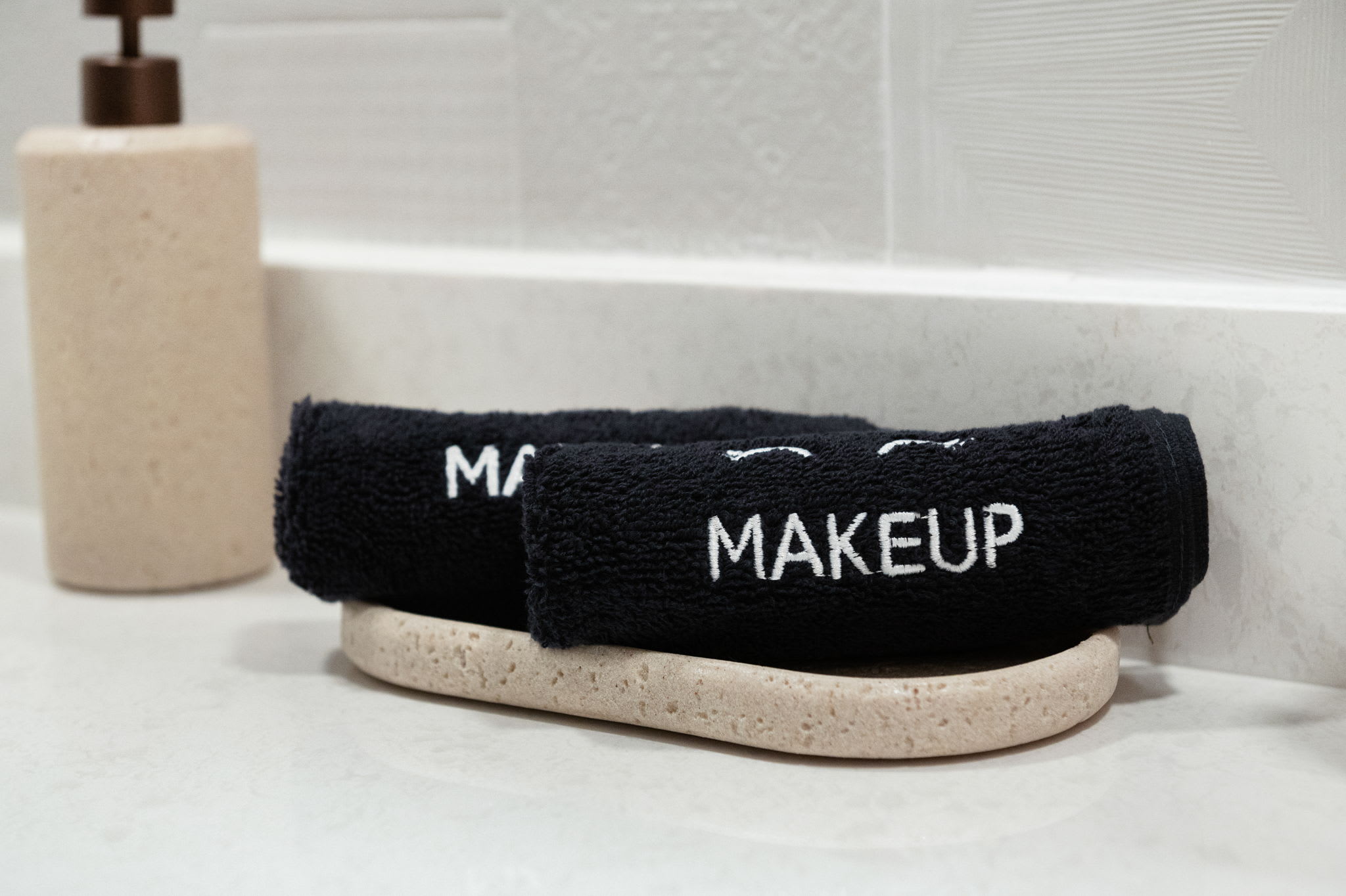 Thoughtful touches like plush towels and elegant storage ensure a comfortable and stylish stay.