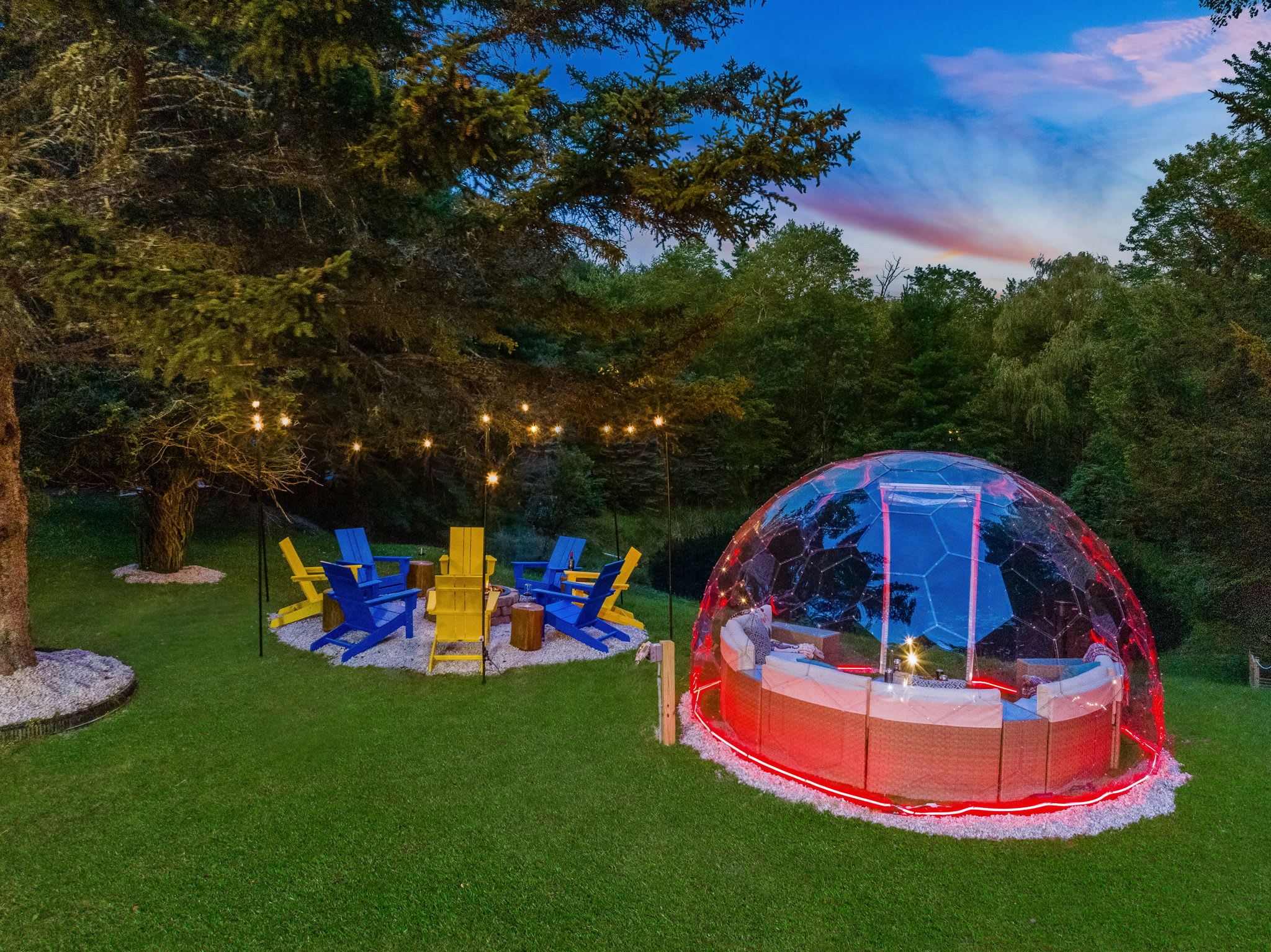 Experience a starlit escape in this unique dome seating area. Enjoy laughter and drinks while the fire crackles nearby, creating a dreamlike ambiance.