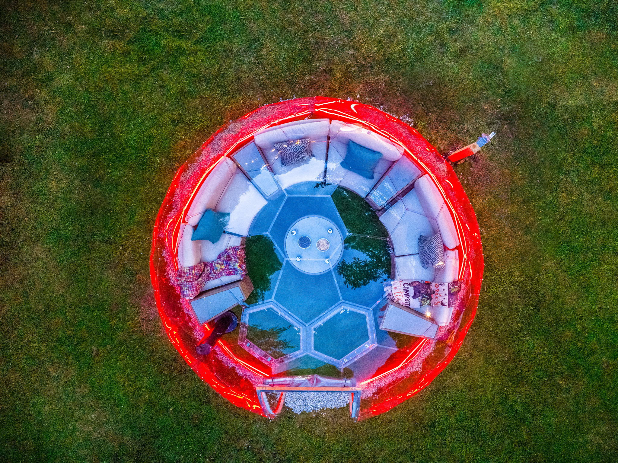 Enjoy nature in a whole new way! This heated, transparent dome lets you relax under the stars while staying warm and cozy inside.