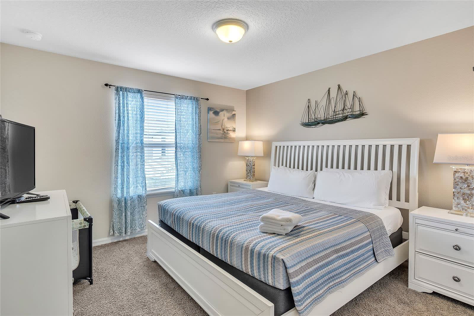 Relax In Style In This Beautifully Designed Bedroom