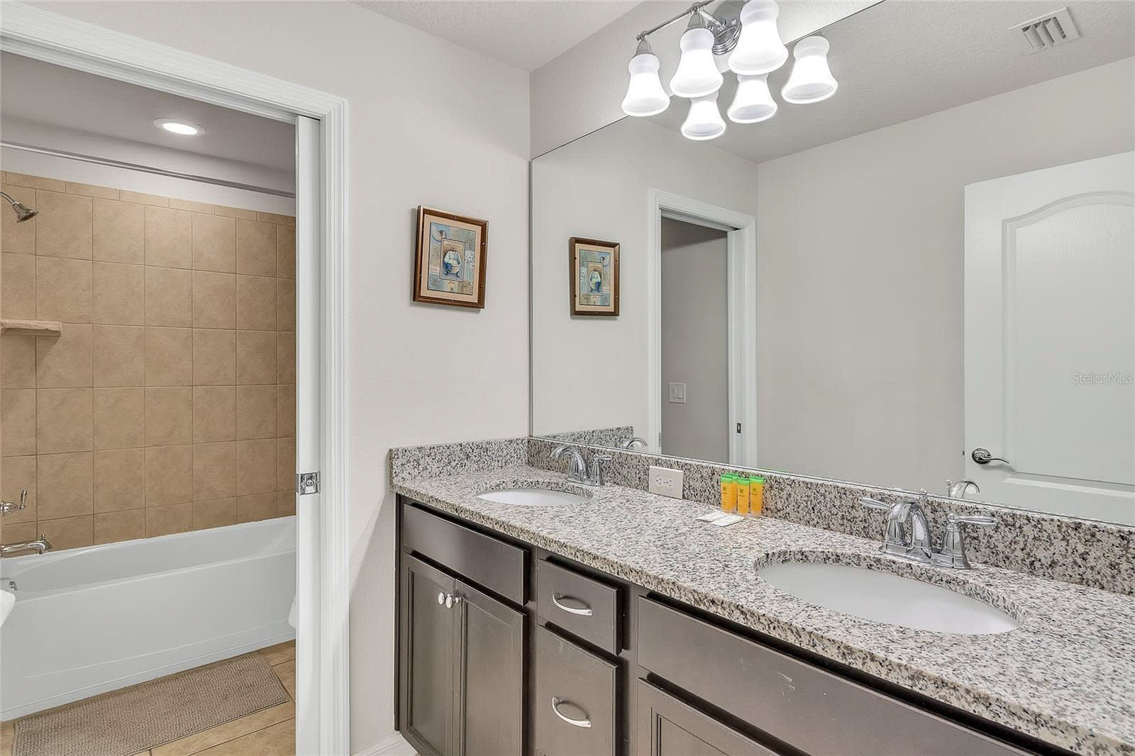 Elegant Bathroom Featuring A Relaxing Bathtub And Modern Fixtures