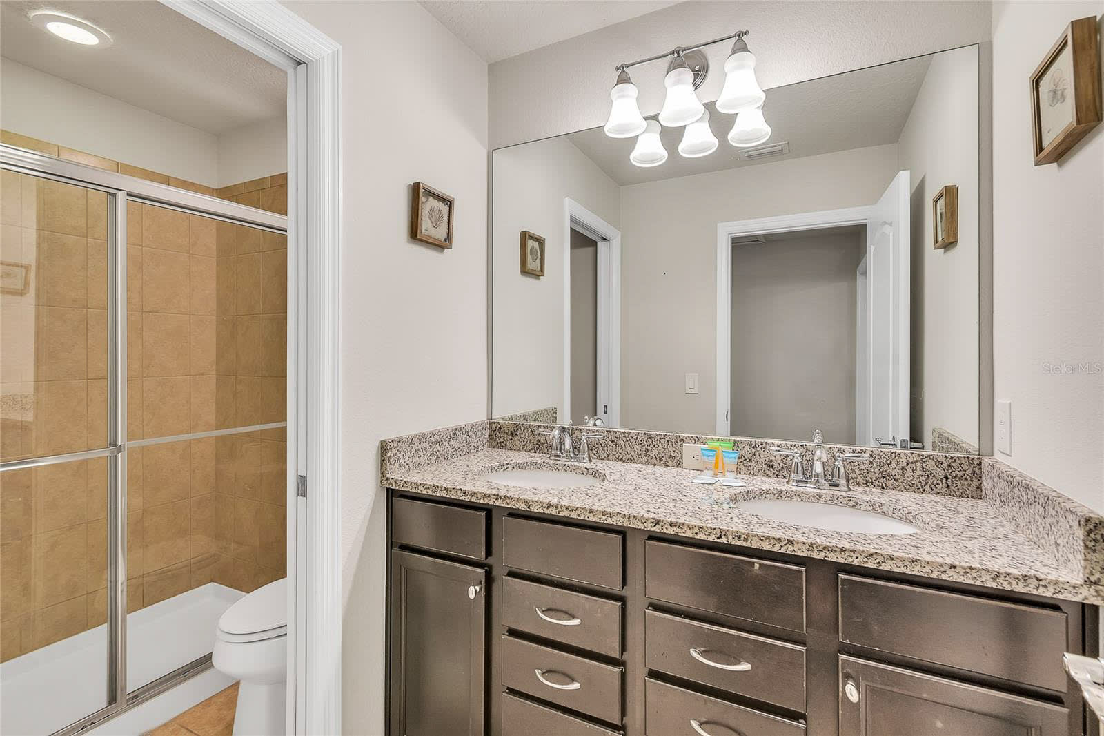 Refresh In This Modern Bathroom Featuring A Walk-In Shower