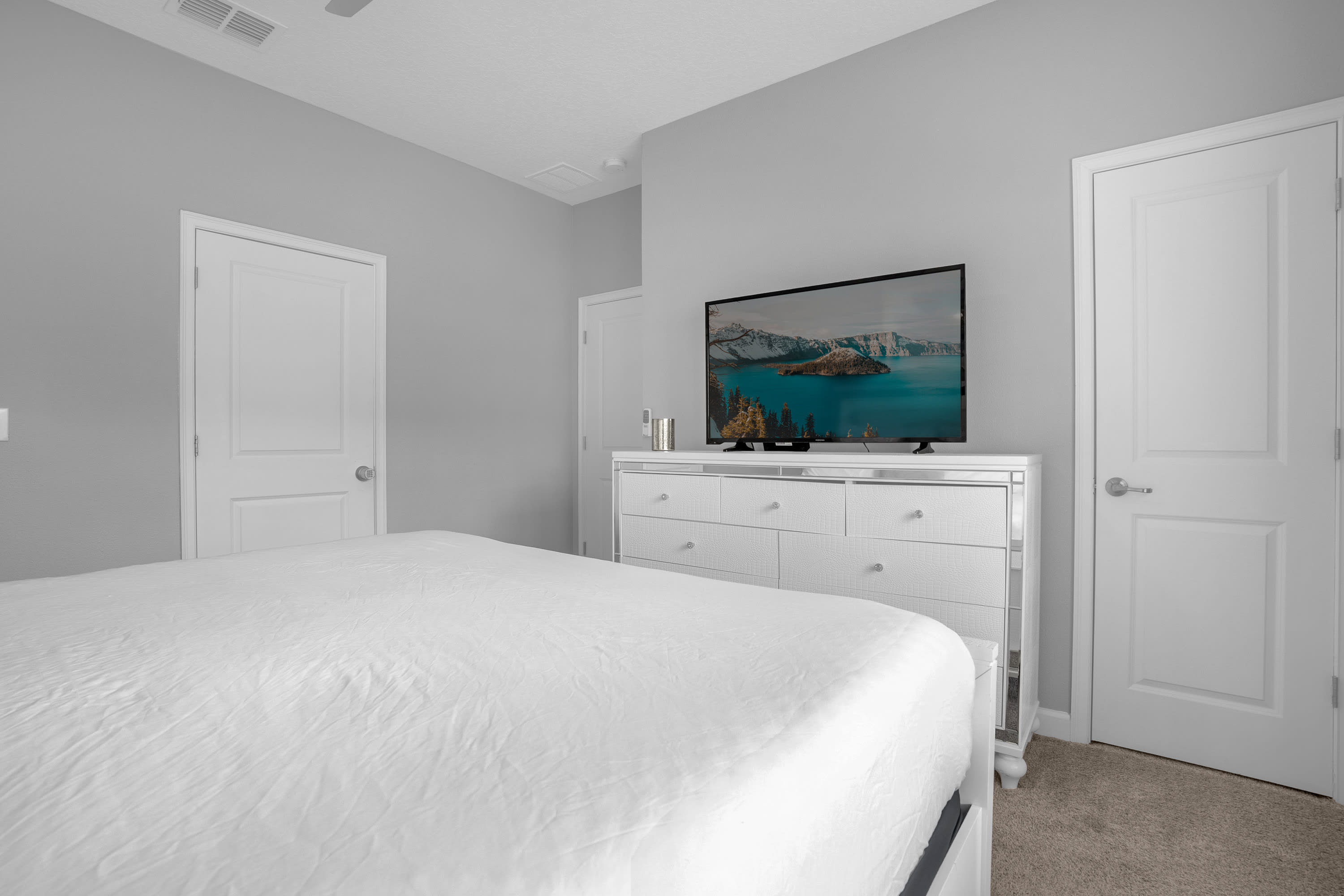 Spacious Queen Bedroom Featuring A Large Ensuite And Smart TV