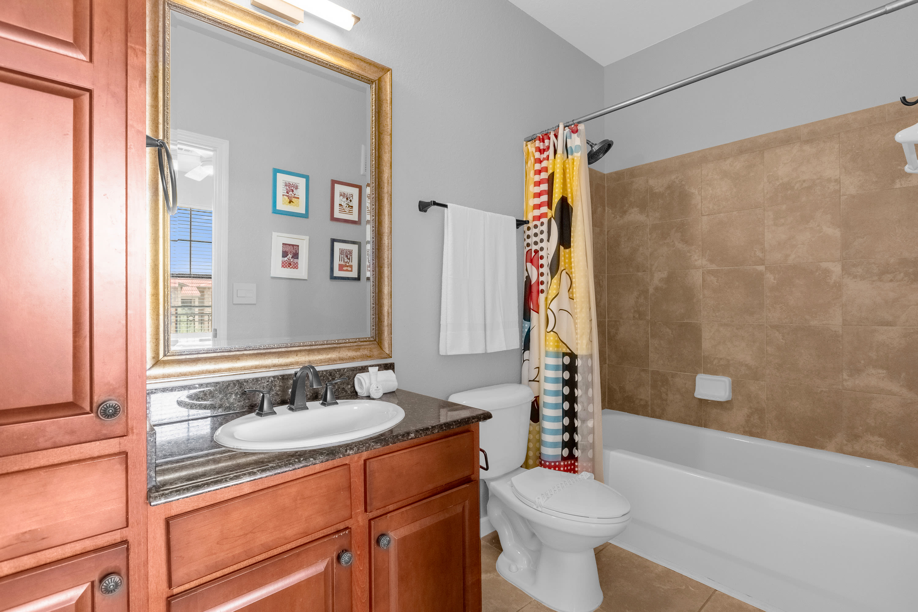 Full Bathroom with Combined Bathtub and Shower