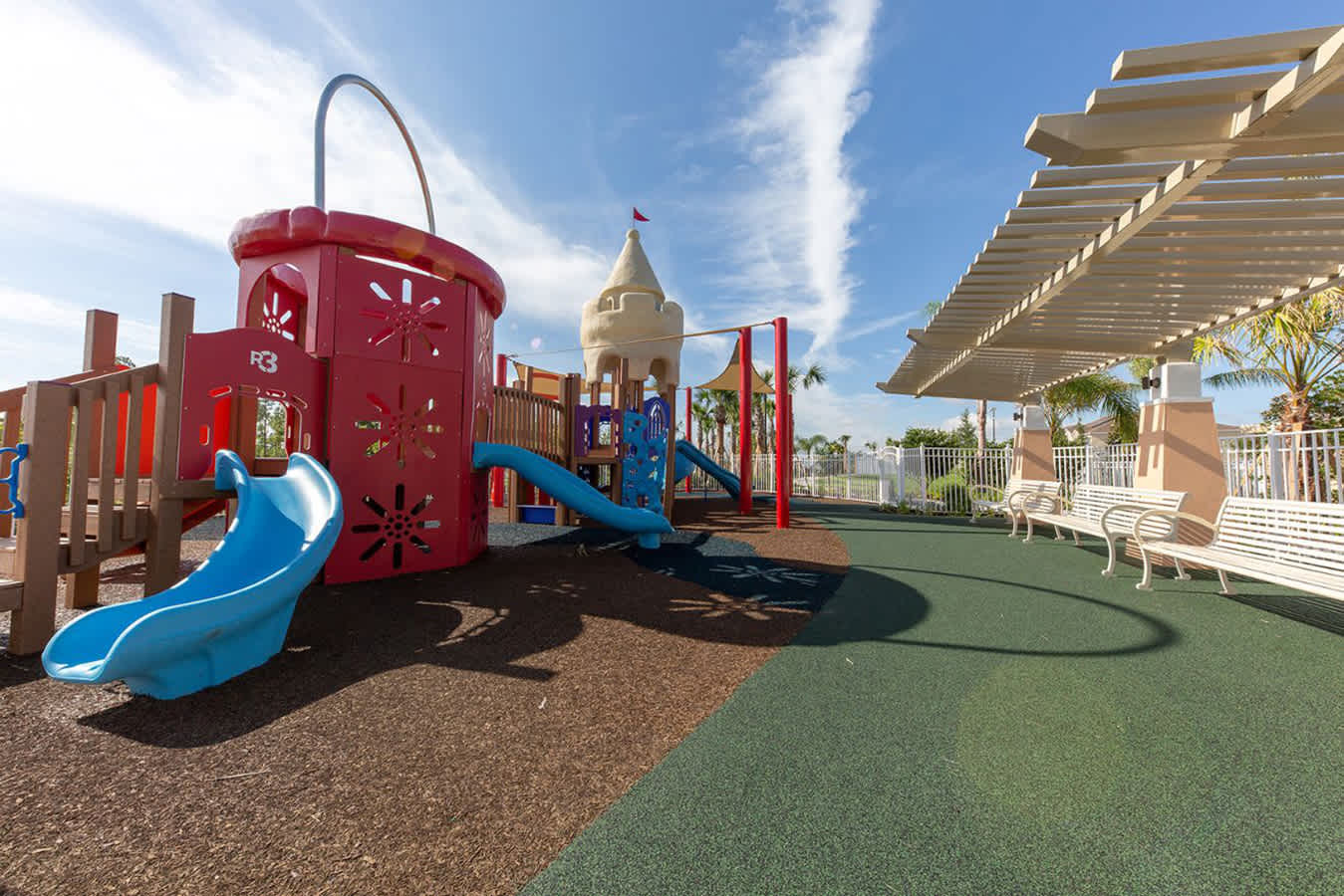 Vibrant Children’s Playground With Slides And Climbing Structures