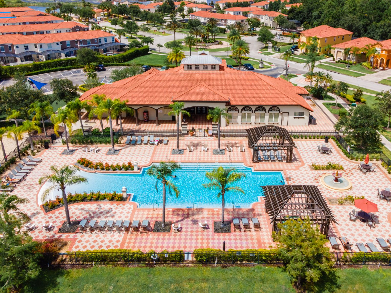 Aerial View Of The Resort's Expansive Pool And Lounge Area