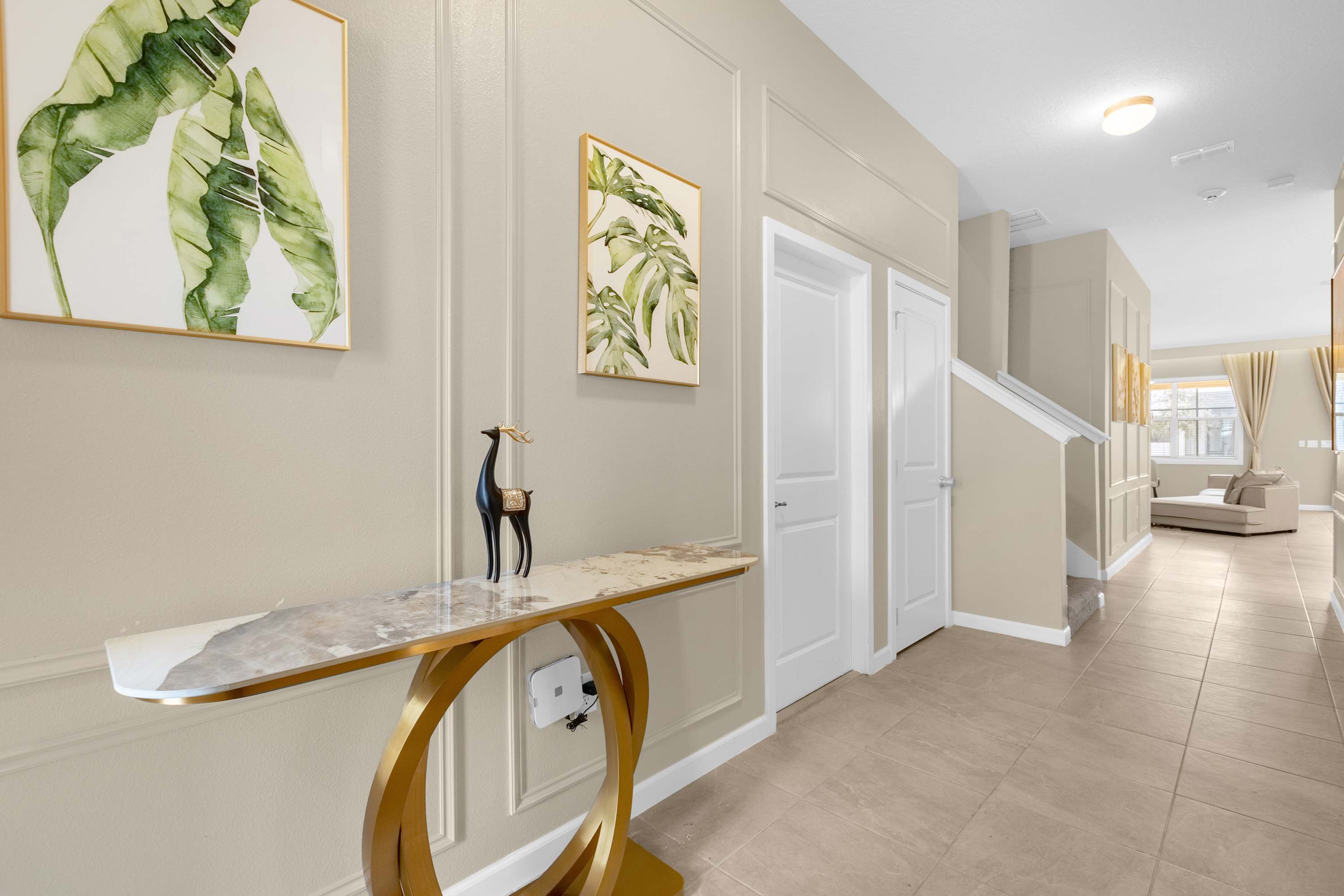 Stylish Entryway Featuring A Sleek Console Table With Elegant Decor