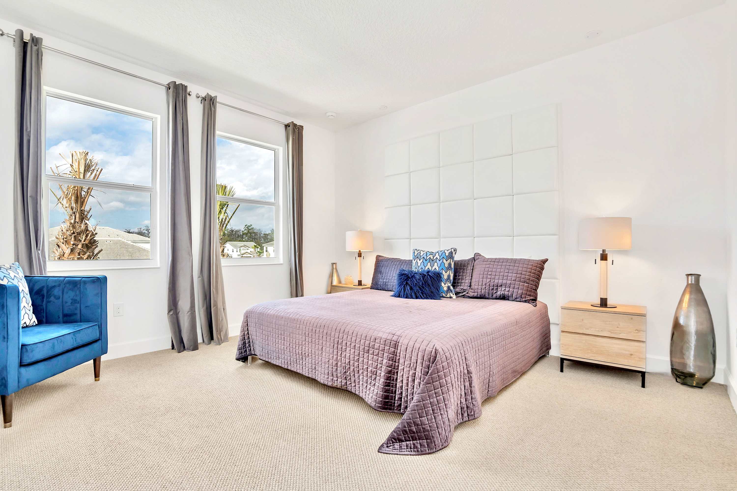 Spacious Room Featuring A Luxurious King Bed And Stylish Furnishings