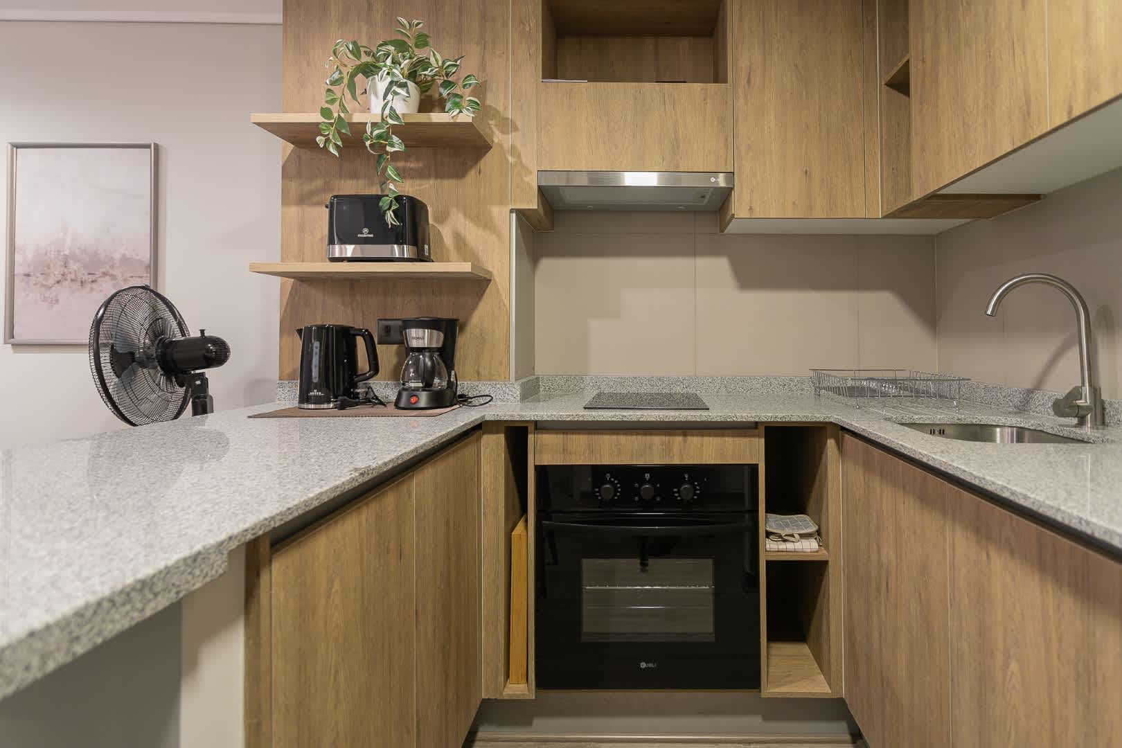 Sleek and modern kitchen with all essentials for a cozy stay in the heart of Chile.