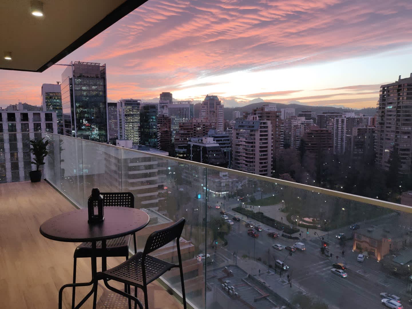 Enjoy breathtaking sunset views over Santiago's skyline from your private balcony, perfect for a romantic evening or a relaxing retreat.