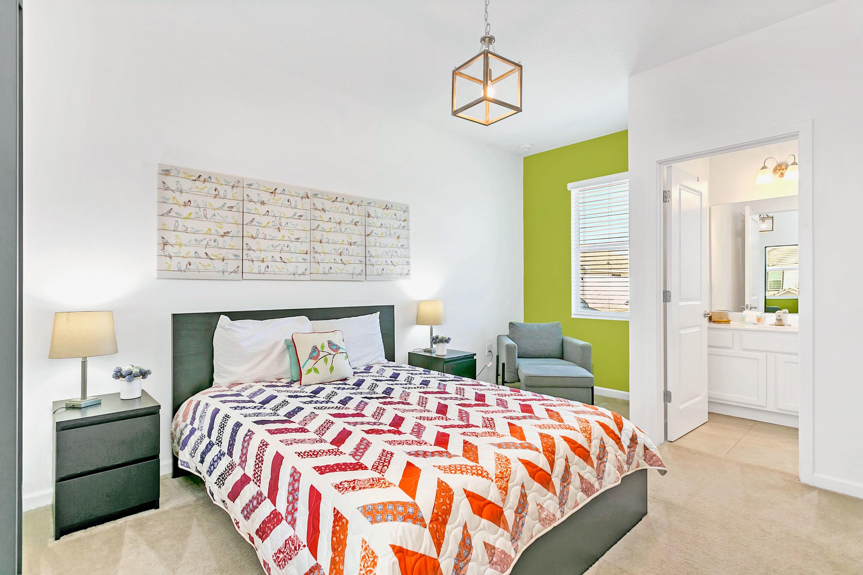 Queen Bedroom Featuring Bold Patterns And Ample Storage Space