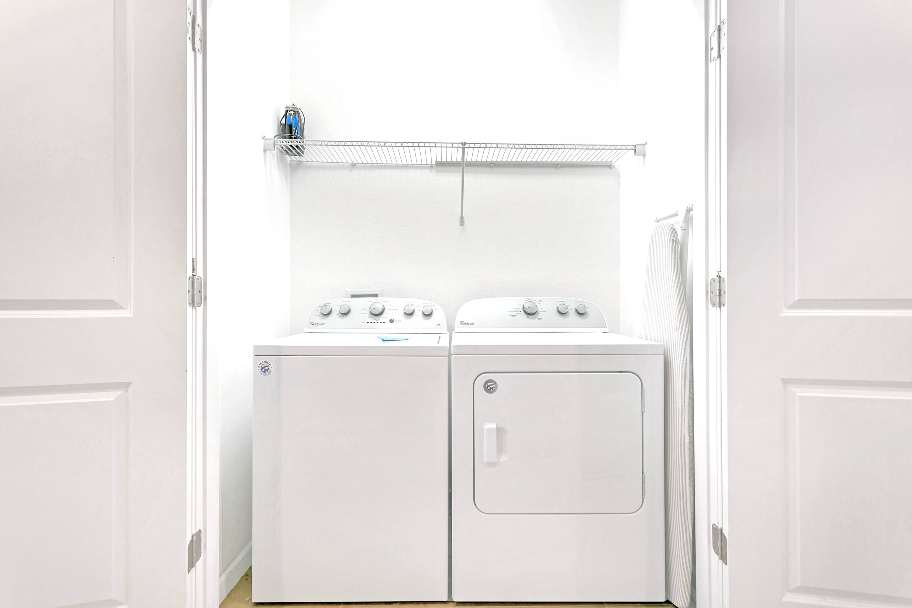 Laundry Room With Washer And Dryer For Guest Convenience