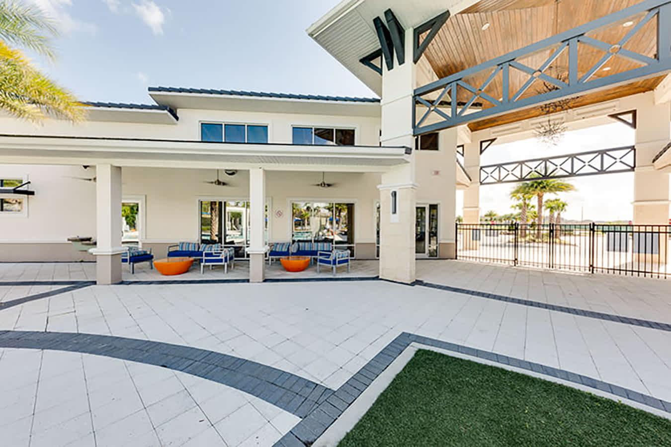 Modern Clubhouse Featuring Stylish Architecture And Spacious Outdoor Areas