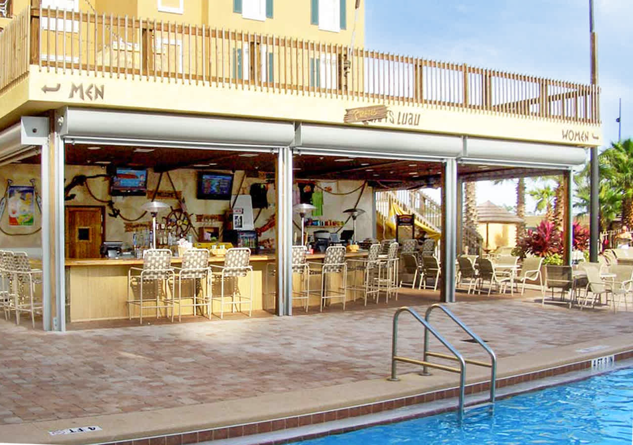 Enjoy Refreshing Drinks And Delicious Meals At The Poolside Bar And Grill