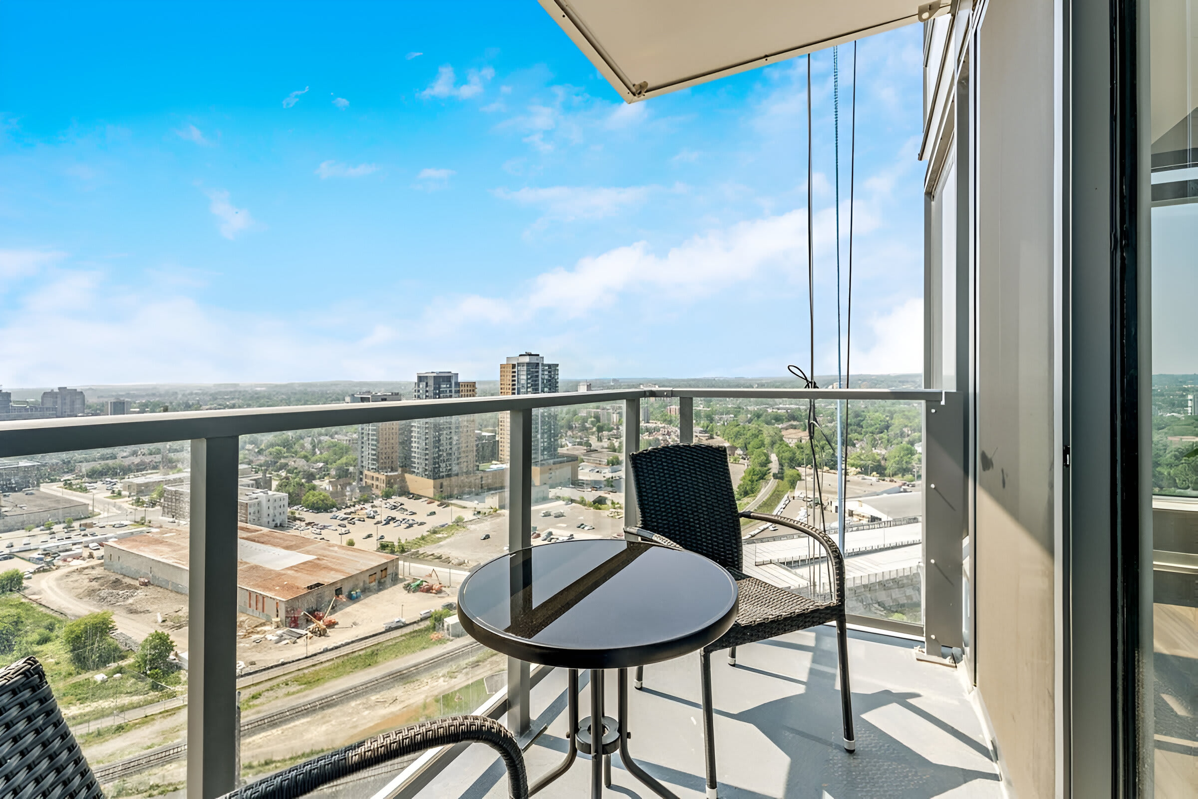 Private Balcony With Spectacular City Views And Comfortable Seating