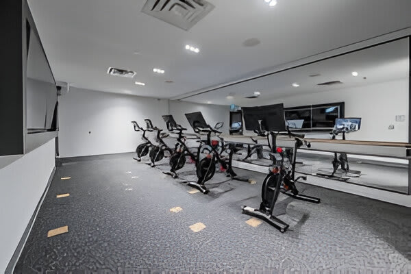 Dedicated Peloton Studio With State-Of-The-Art Spin Equipment And Screens