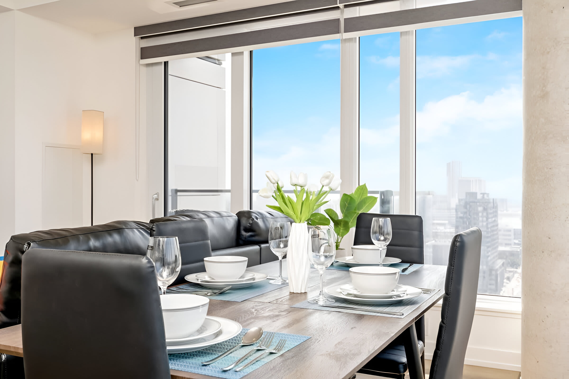 Dining Table Set For Four Guests With Modern Décor And Panoramic Views