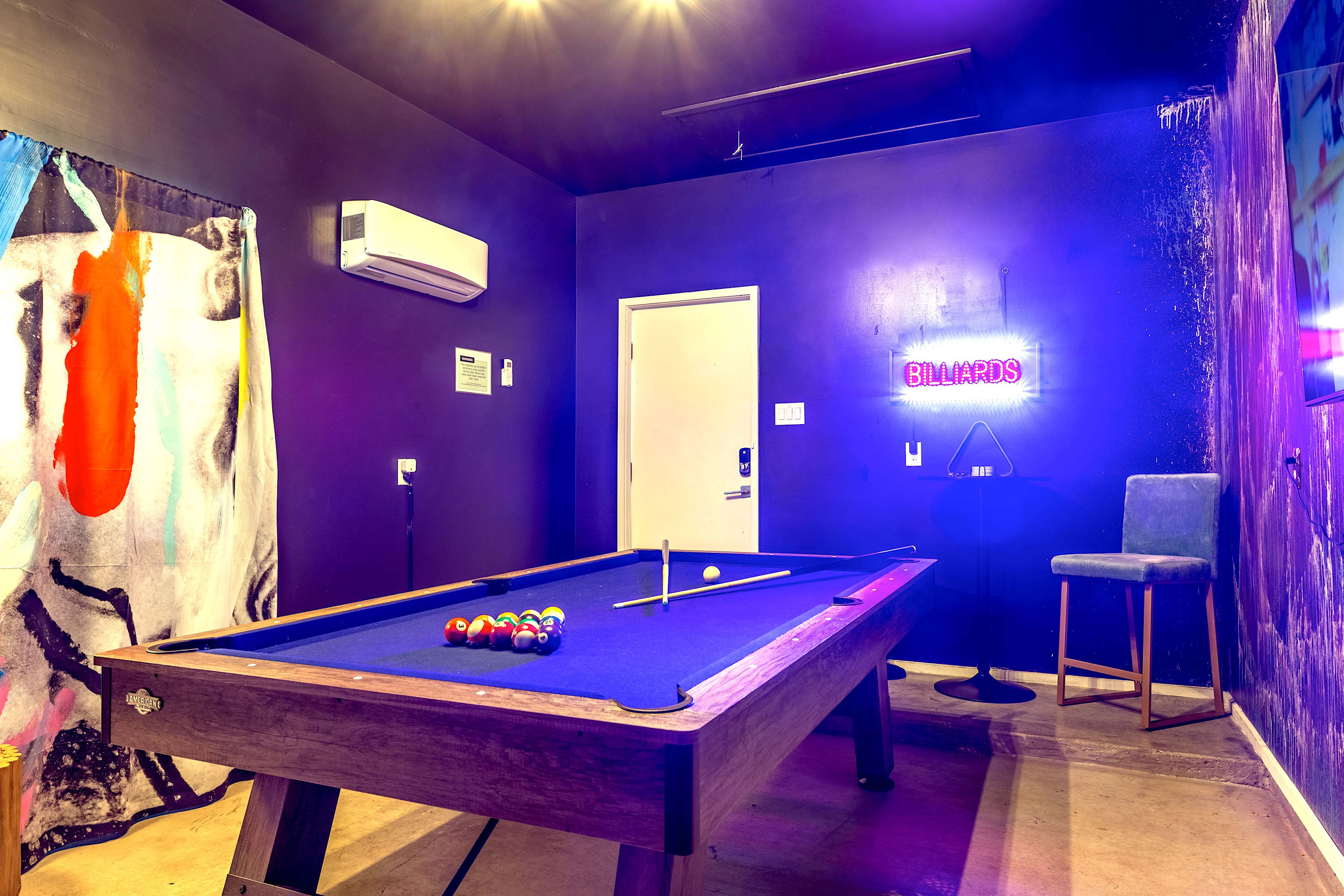 Spacious Game Room With Pool Table
