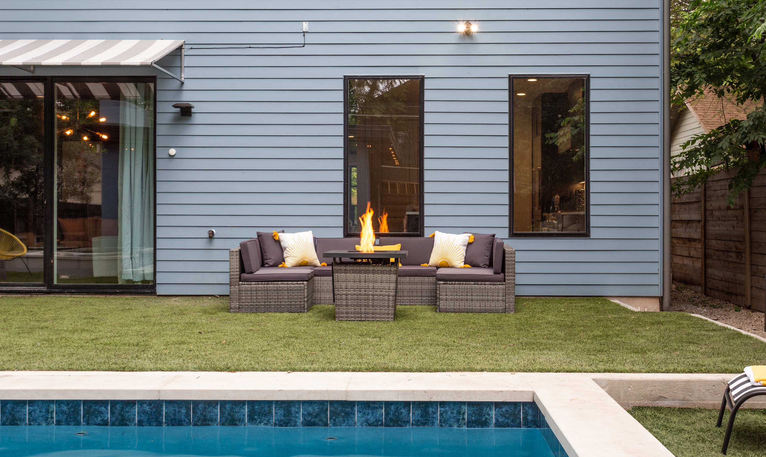 After a dip in your private swimming pool, cozy up around the outdoor fireplace.