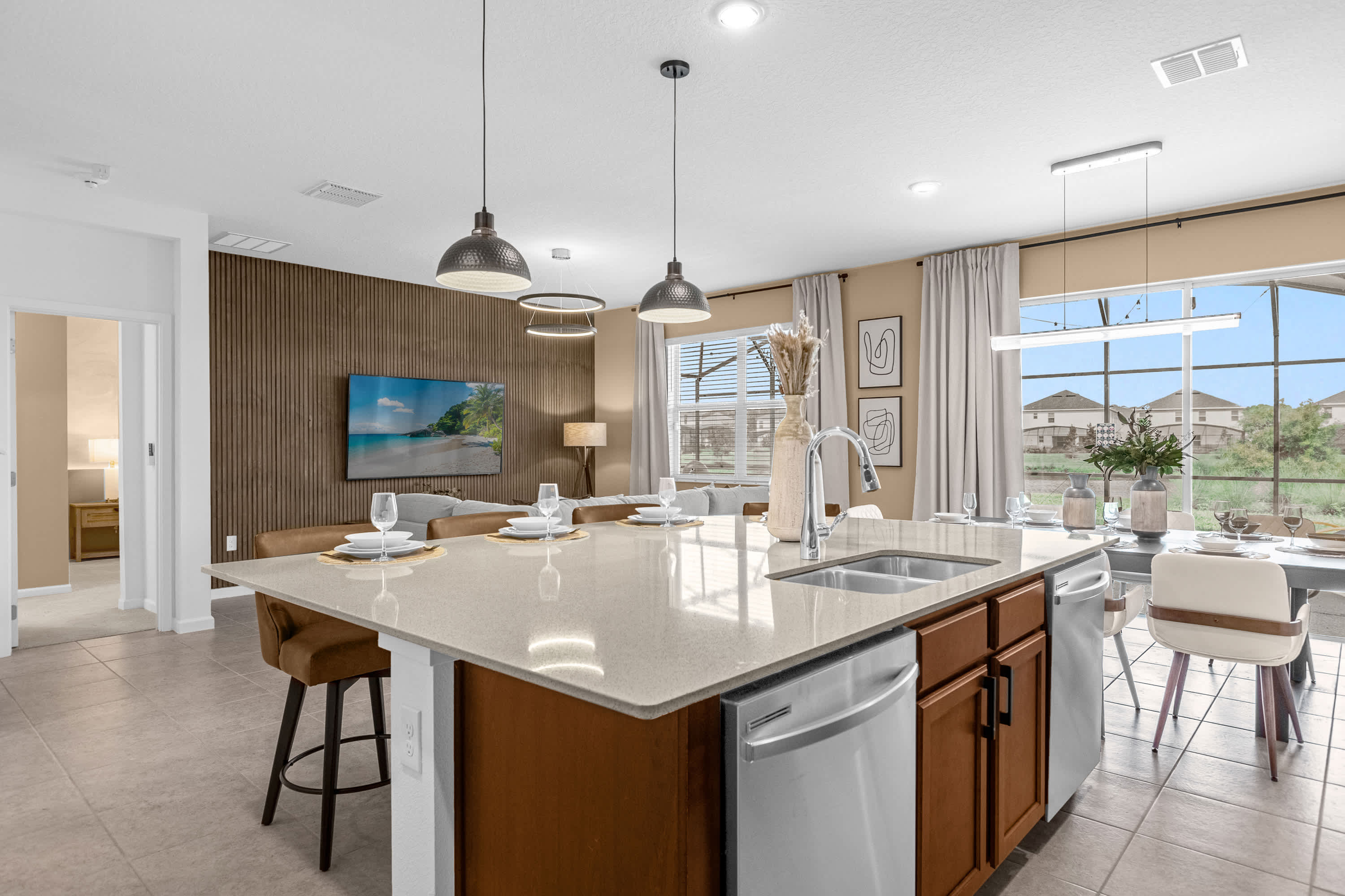 Spacious Kitchen Island Overlooking An Open-Concept Living And Dining Area