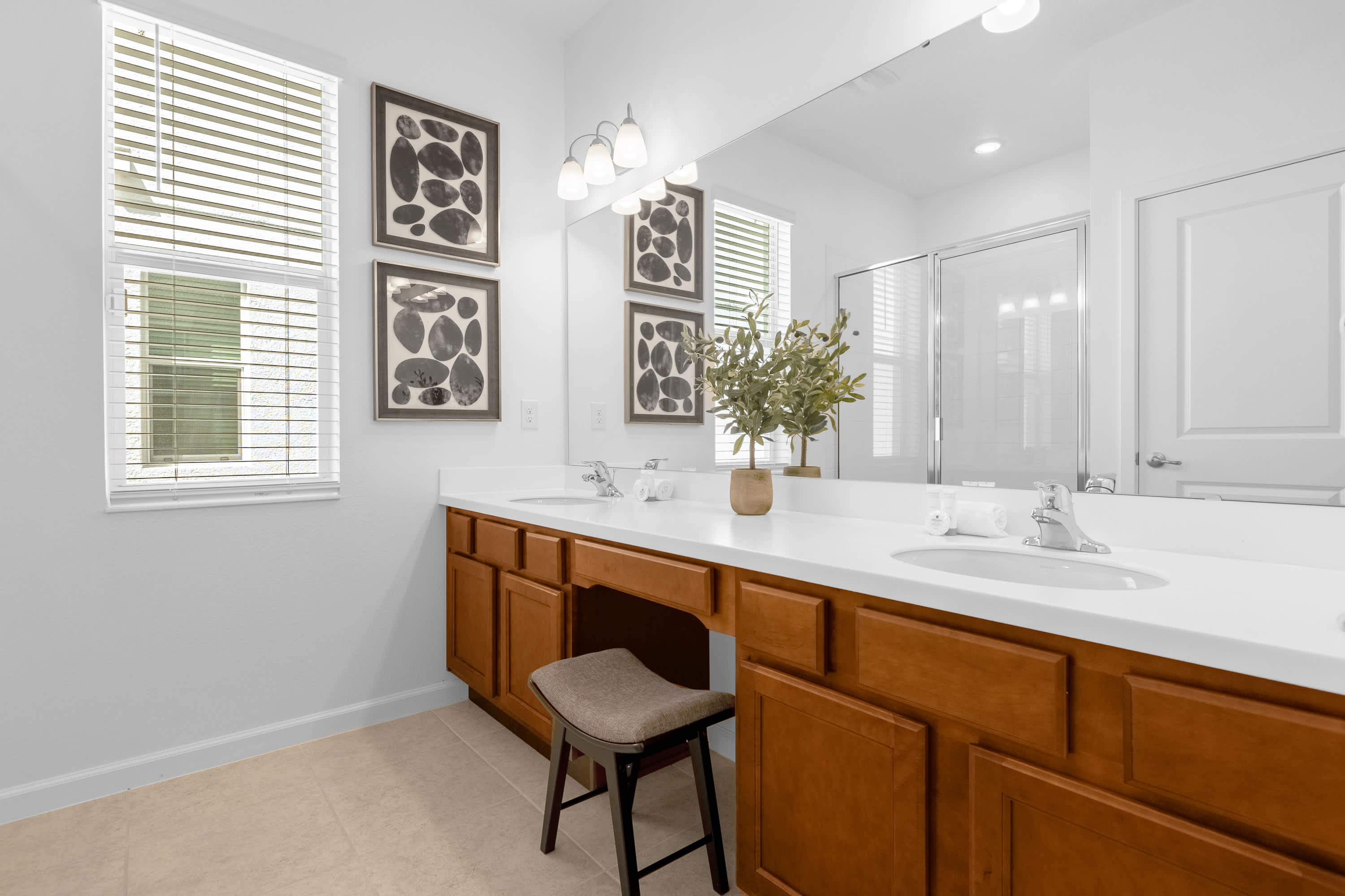 Modern Bathroom Featuring A Double Vanity And Ample Space