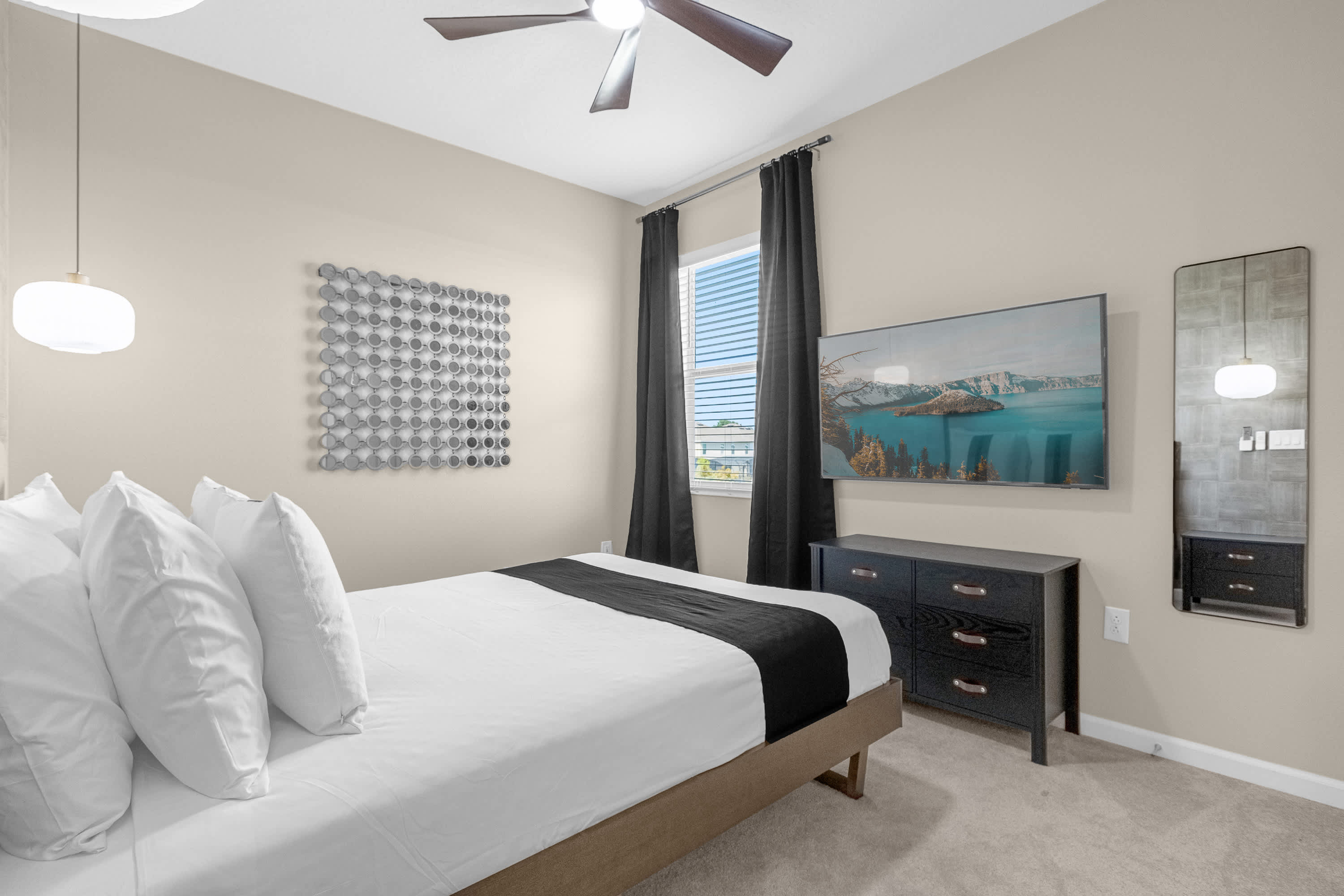 Modern Bedroom With Streamlined Furniture And Neutral Colors