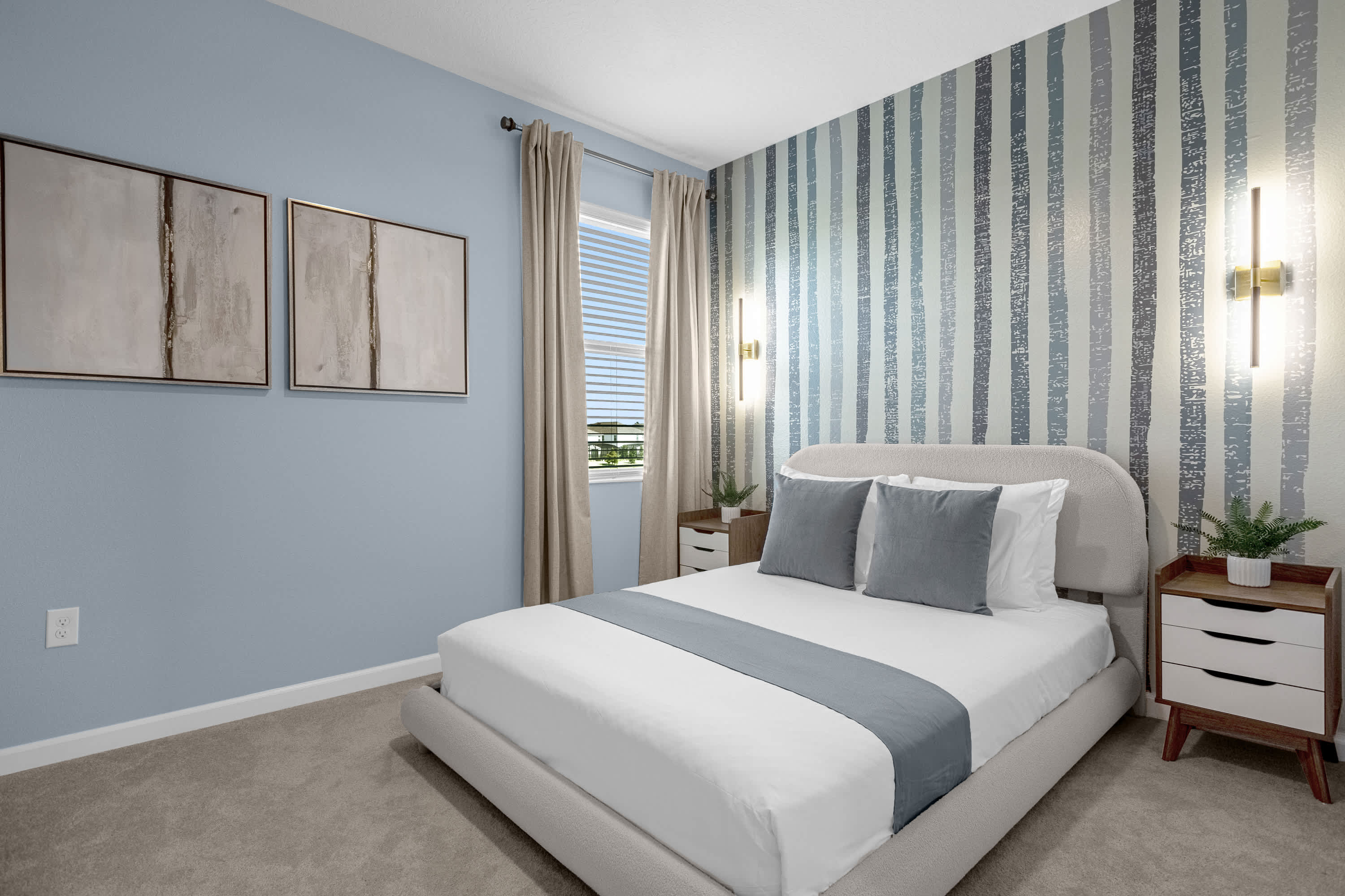 Bright Bedroom With Soft Blue Accents And Ample Natural Light