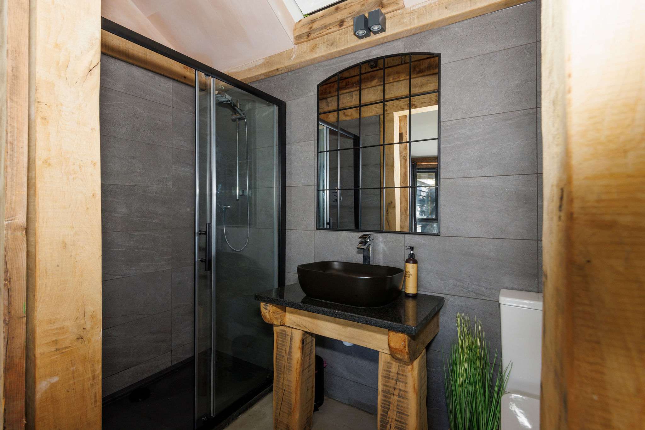 There is a spacious en suite bathroom off the master bedroom with a large shower, sink and wc.