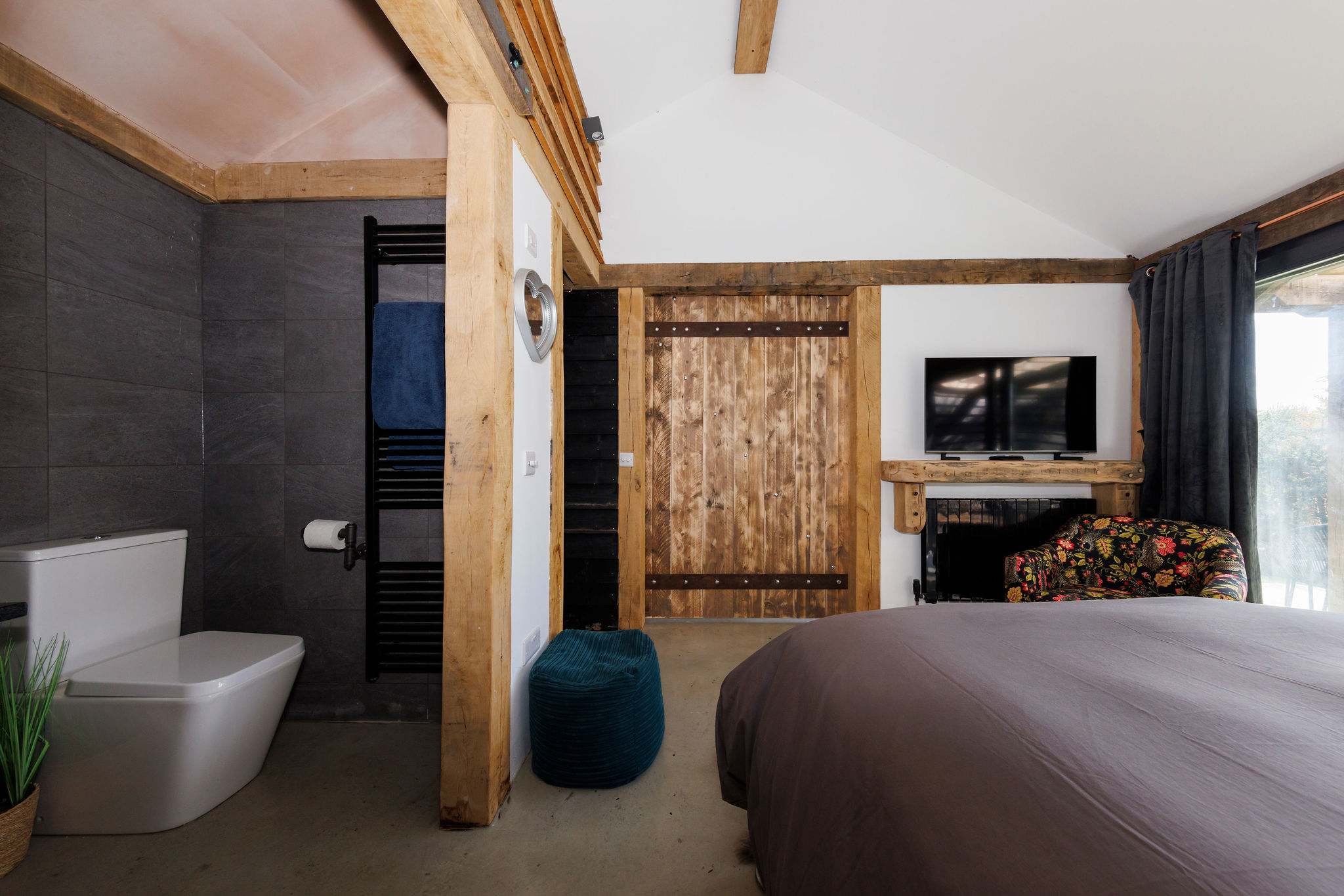 The en suite bathroom with pocket sliding doors for privacy.