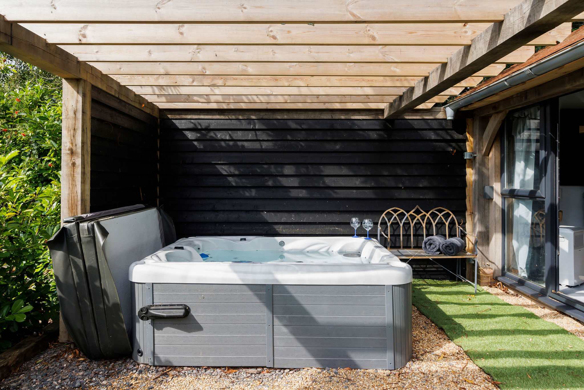 The hot tub is open and heated all year round.