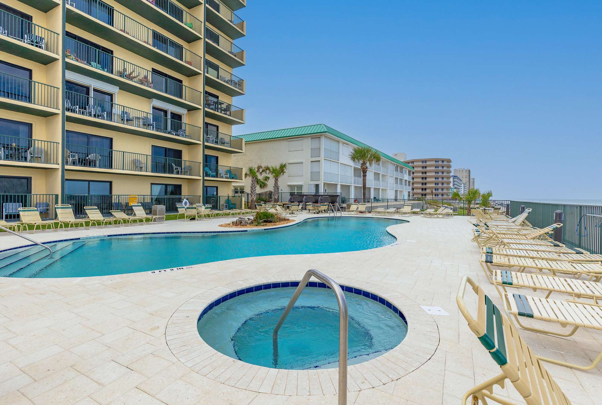 Tropical Palms | Partial Ocean View, Pool, Hot Tub — Daytona Beach Shores, FL — vacation rental
