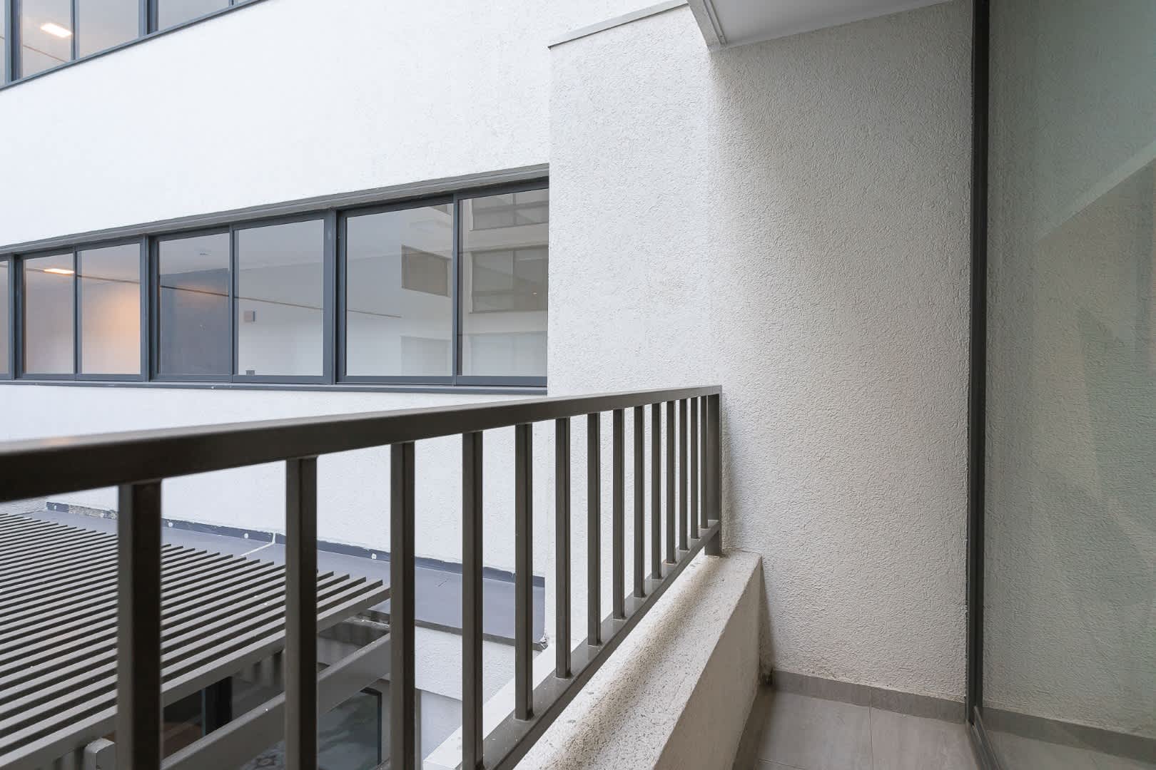 Enjoy a breath of fresh air from this cozy balcony, perfect for a morning coffee or evening relaxation.