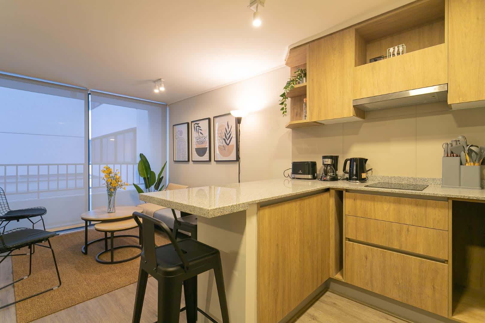 Cozy and modern kitchen with all essentials, perfect for a relaxing meal in your private Chilean studio.